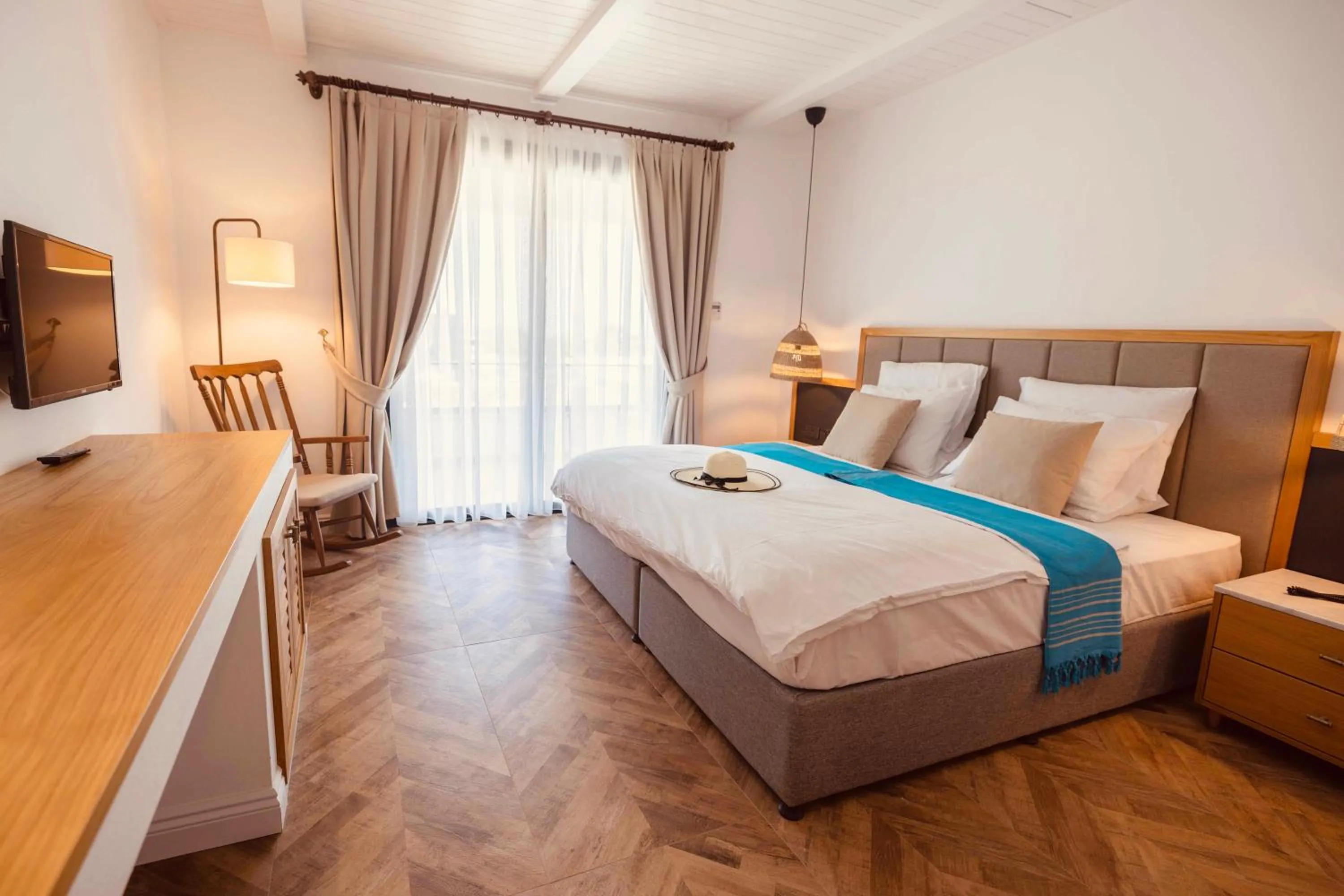 Bed in Palmonte Suites Hotel & SPA