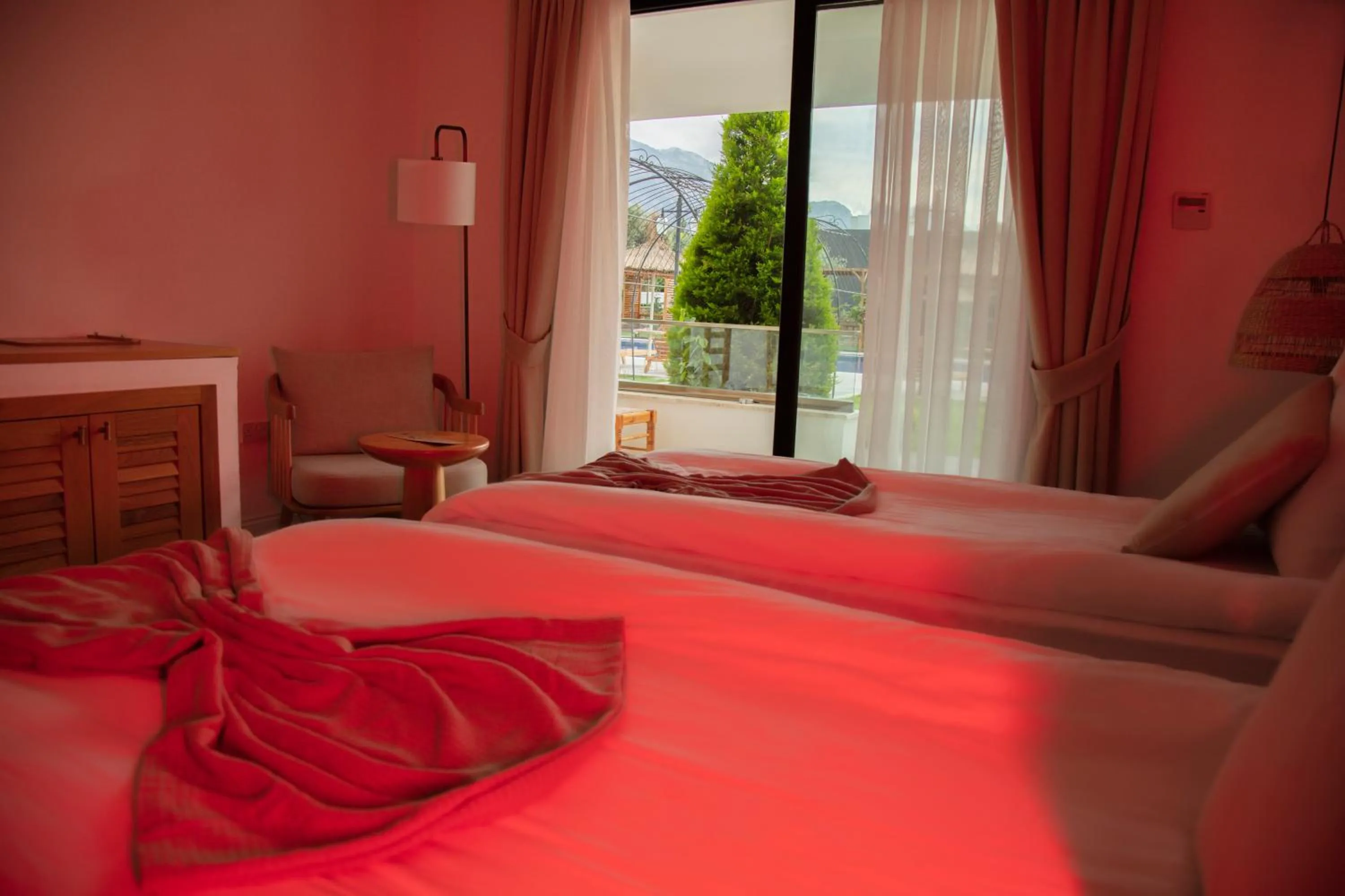 Bed in Palmonte Suites Hotel & SPA