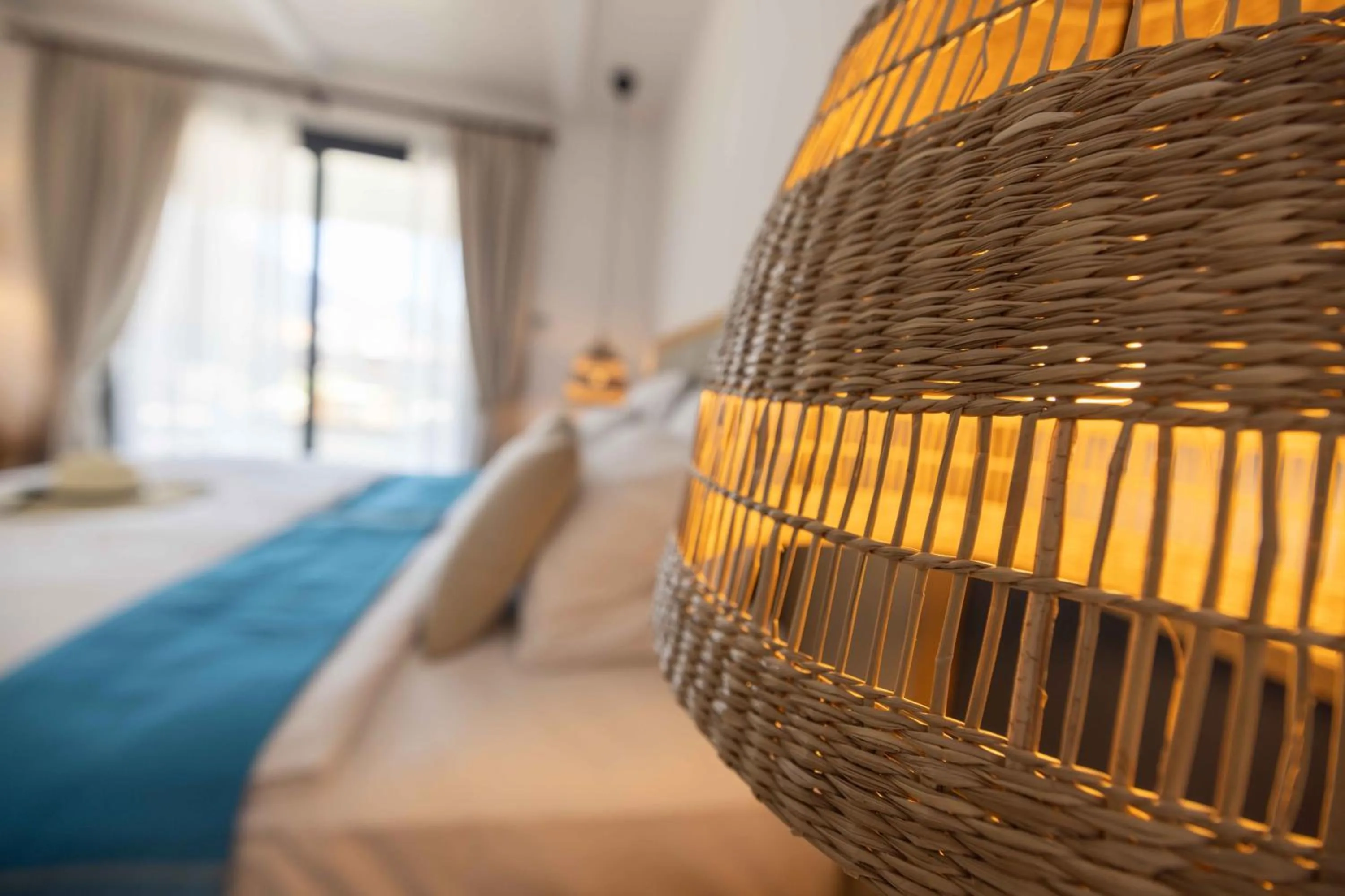 Bed in Palmonte Suites Hotel & SPA