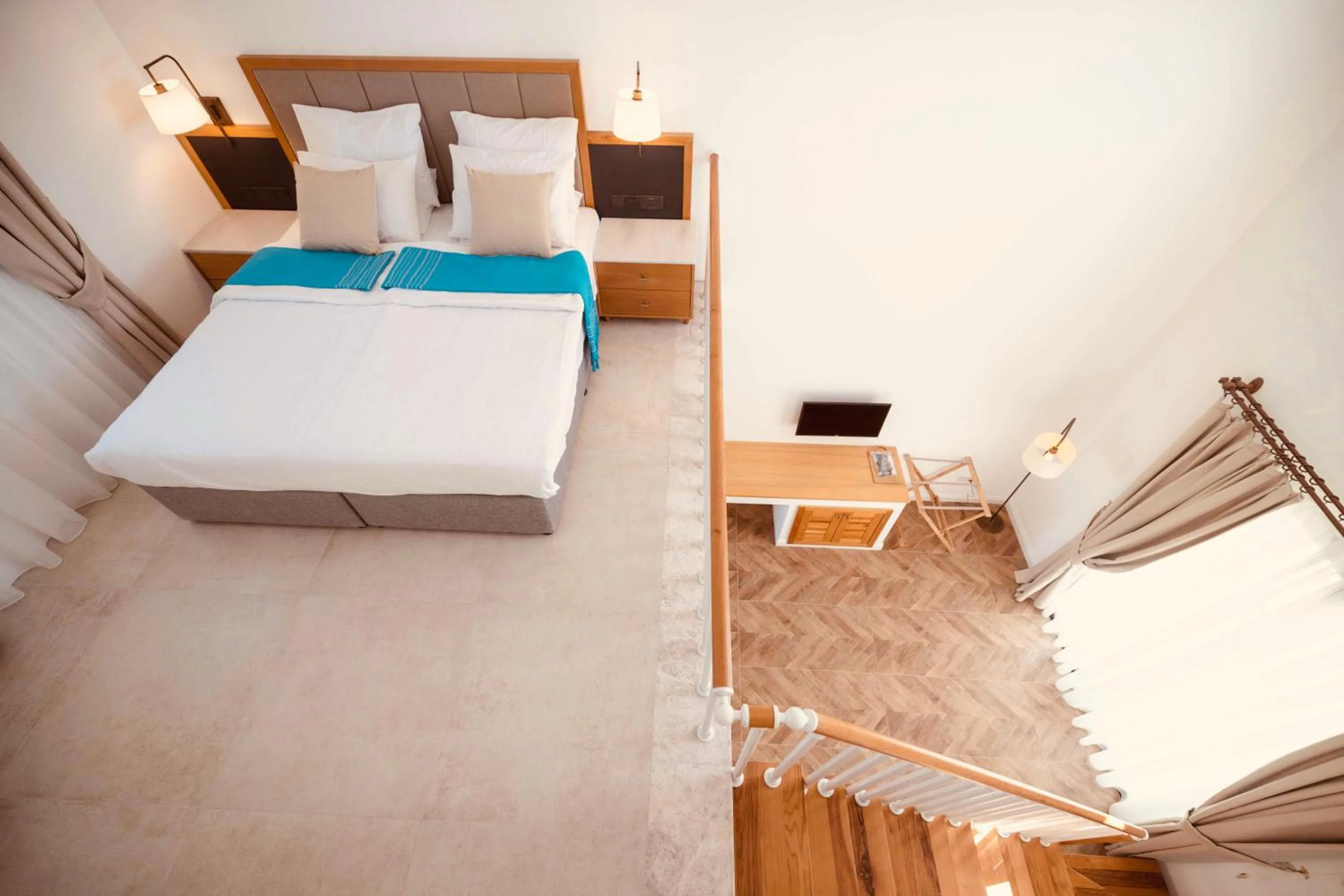 Bed in Palmonte Suites Hotel & SPA