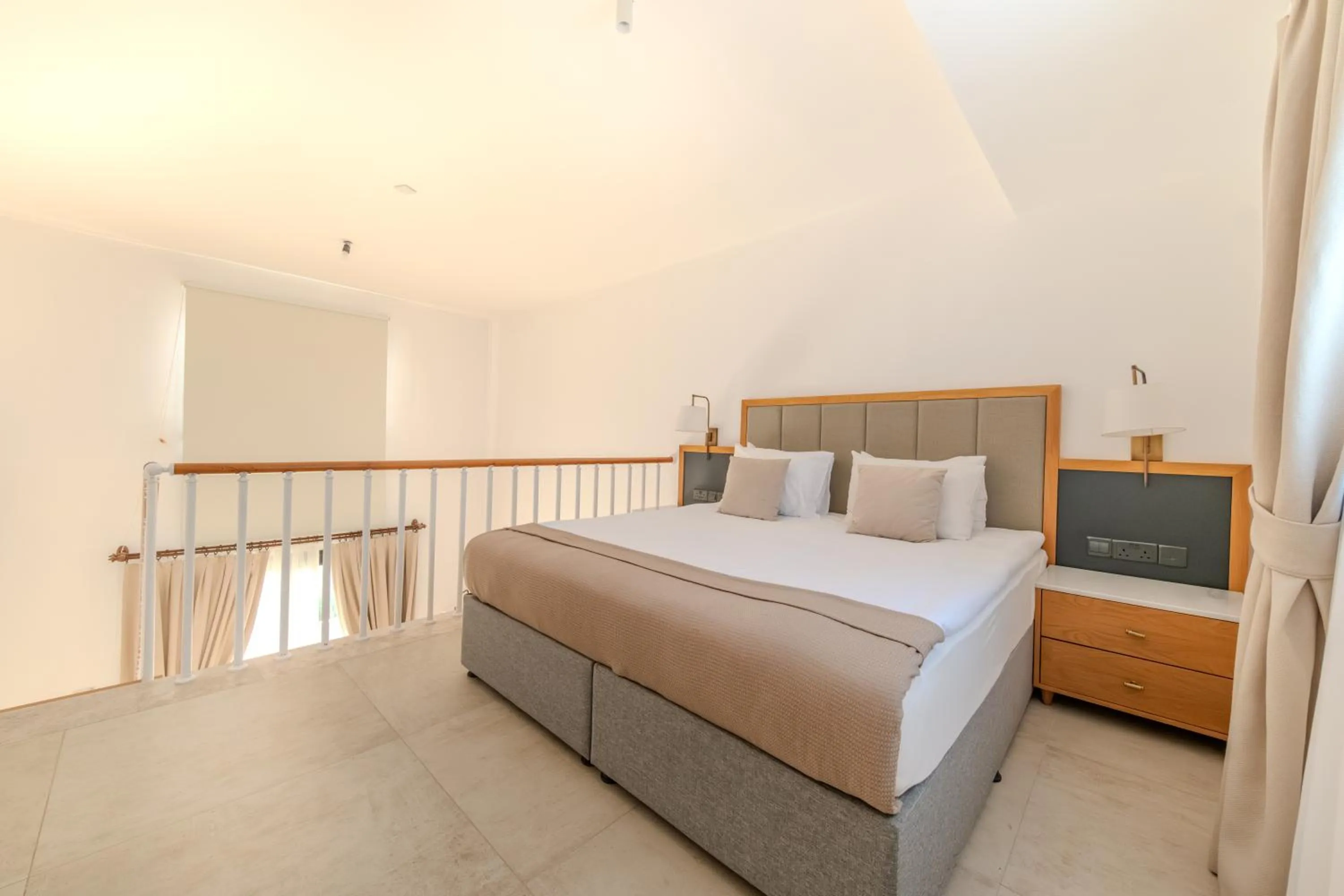 Bed in Palmonte Suites Hotel & SPA