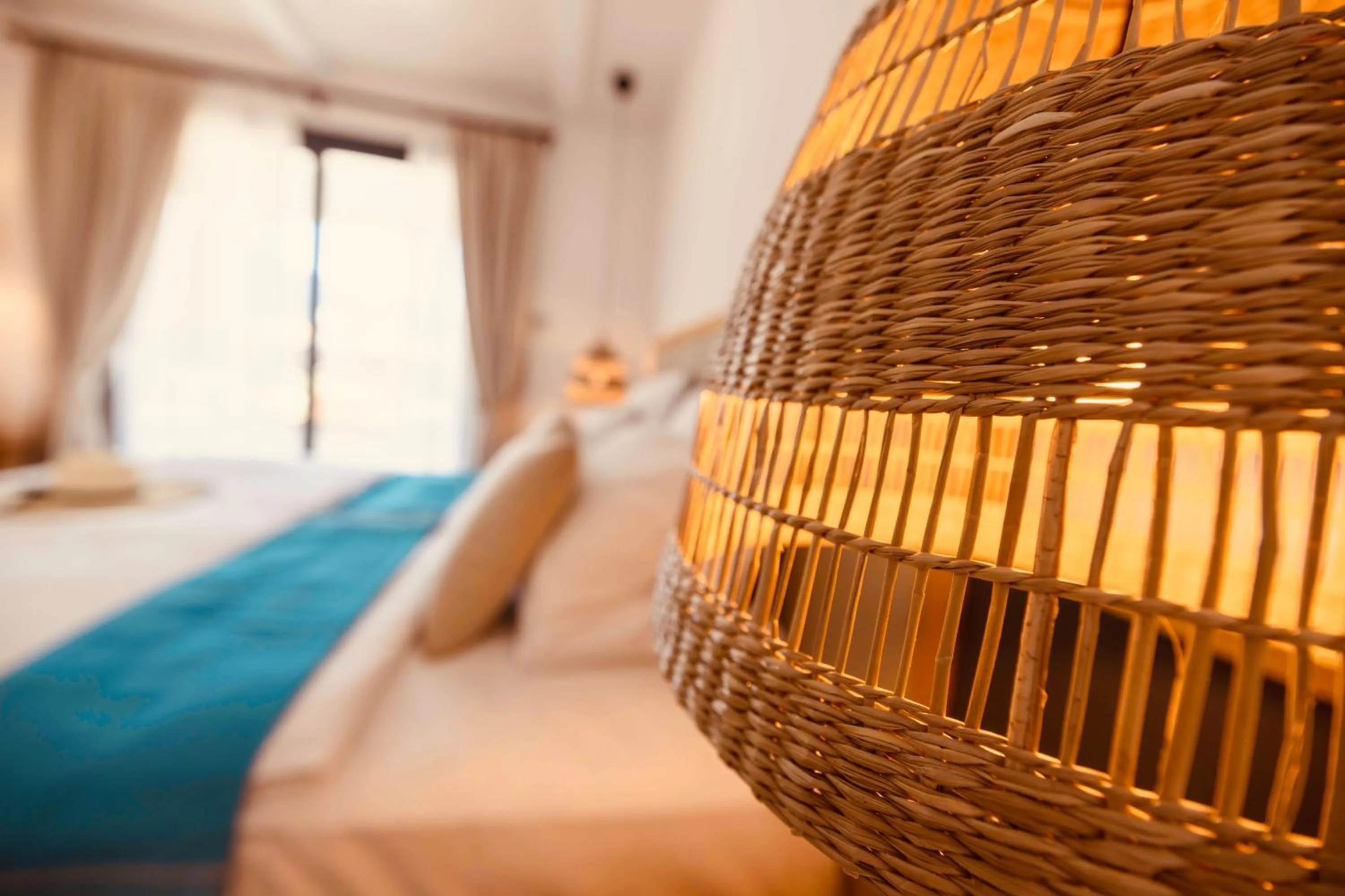 Bed in Palmonte Suites Hotel & SPA