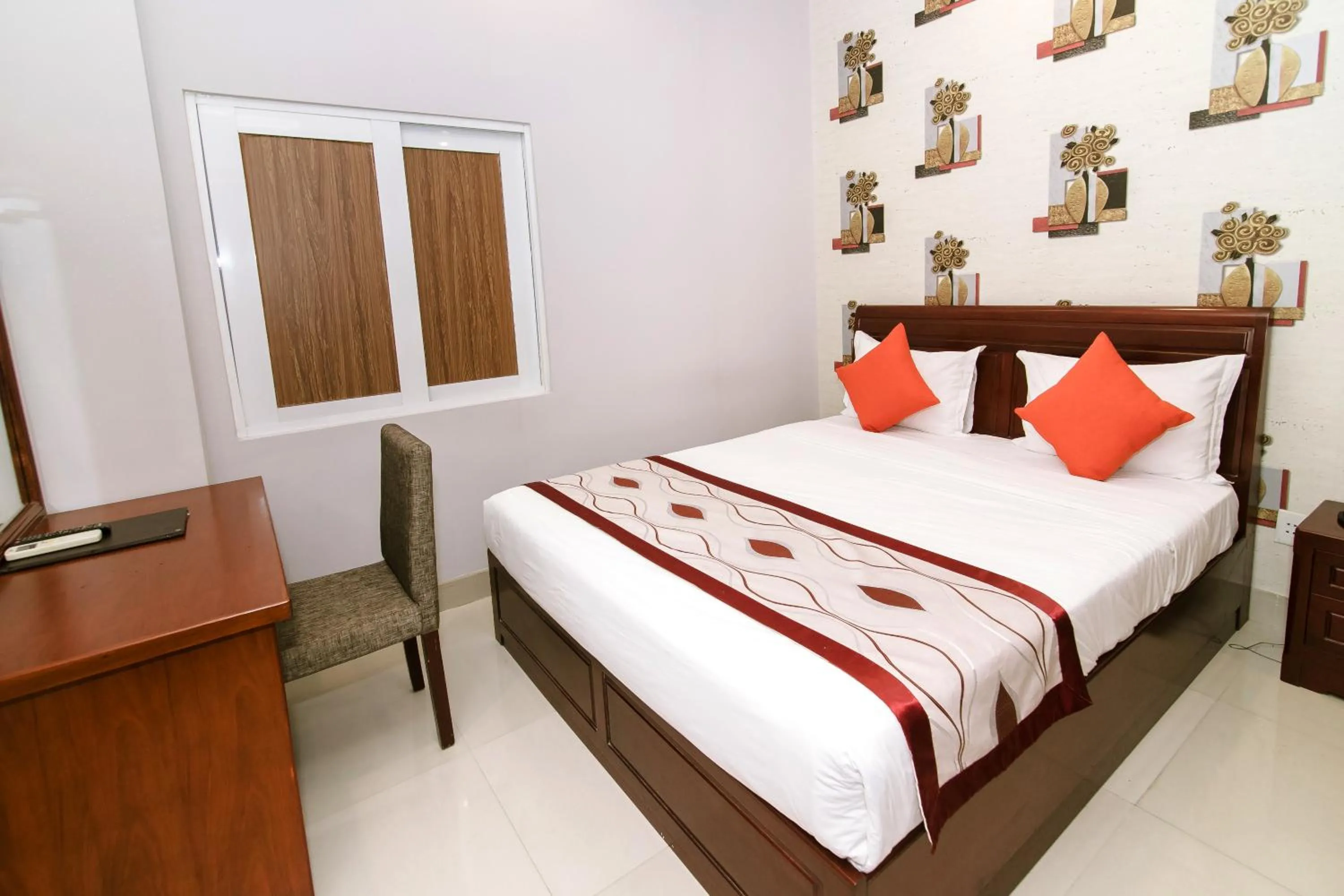 Bed in Long Bao Chau Hotel