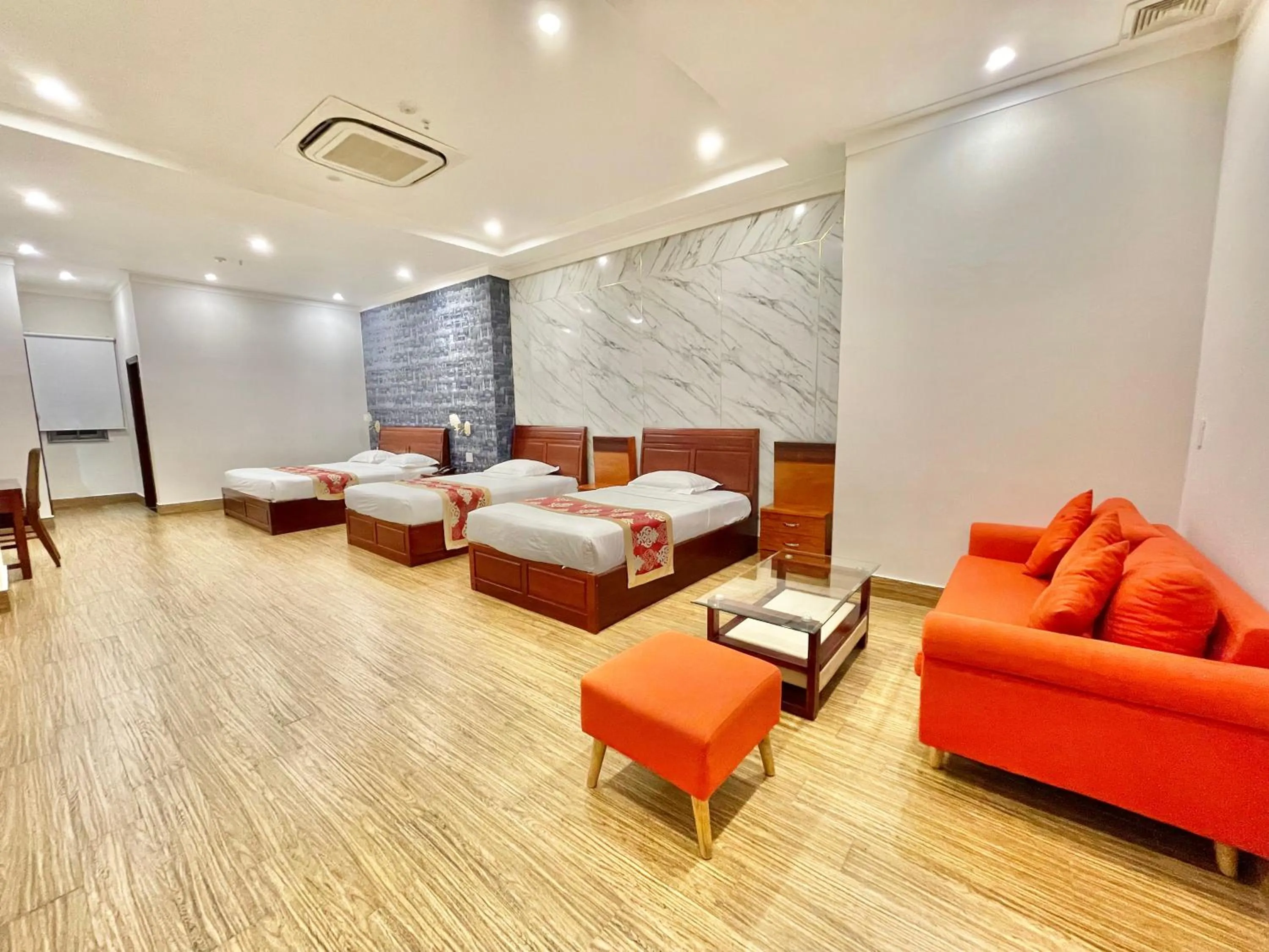 Living room, Bed in Long Bao Chau Hotel