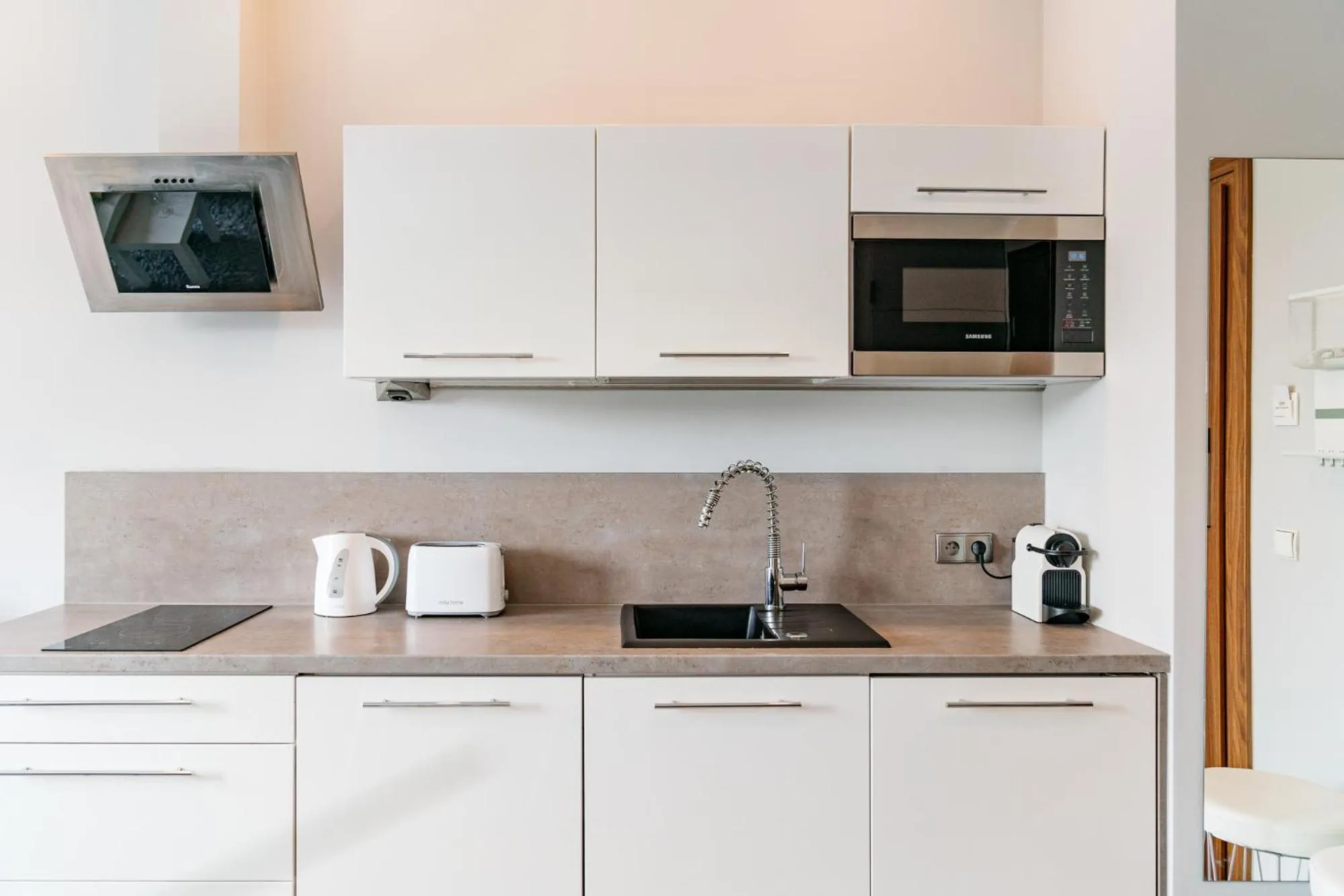 kitchen in Bright Apartments - LoftAffair