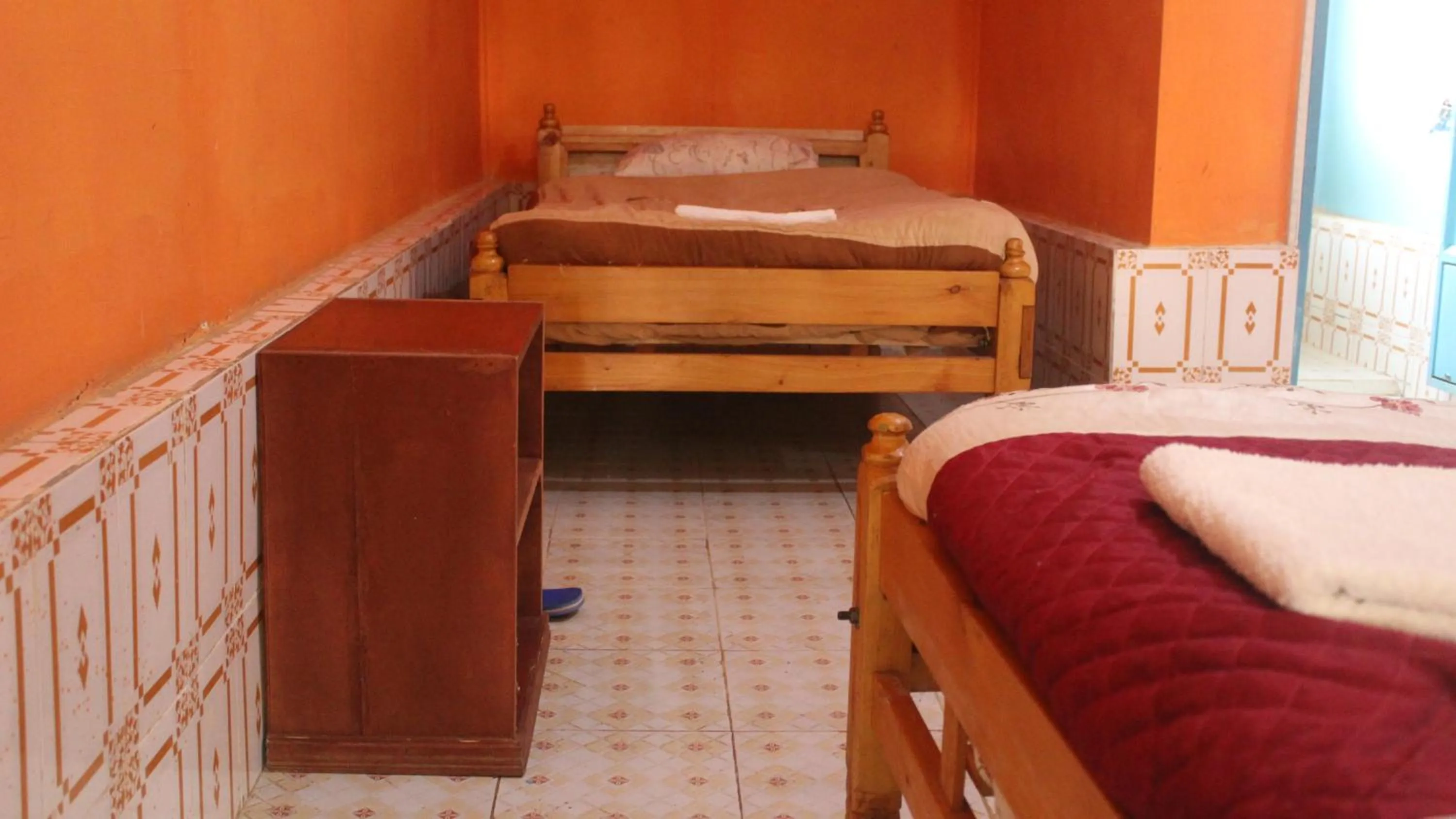 Bed in Tranquil Homestays