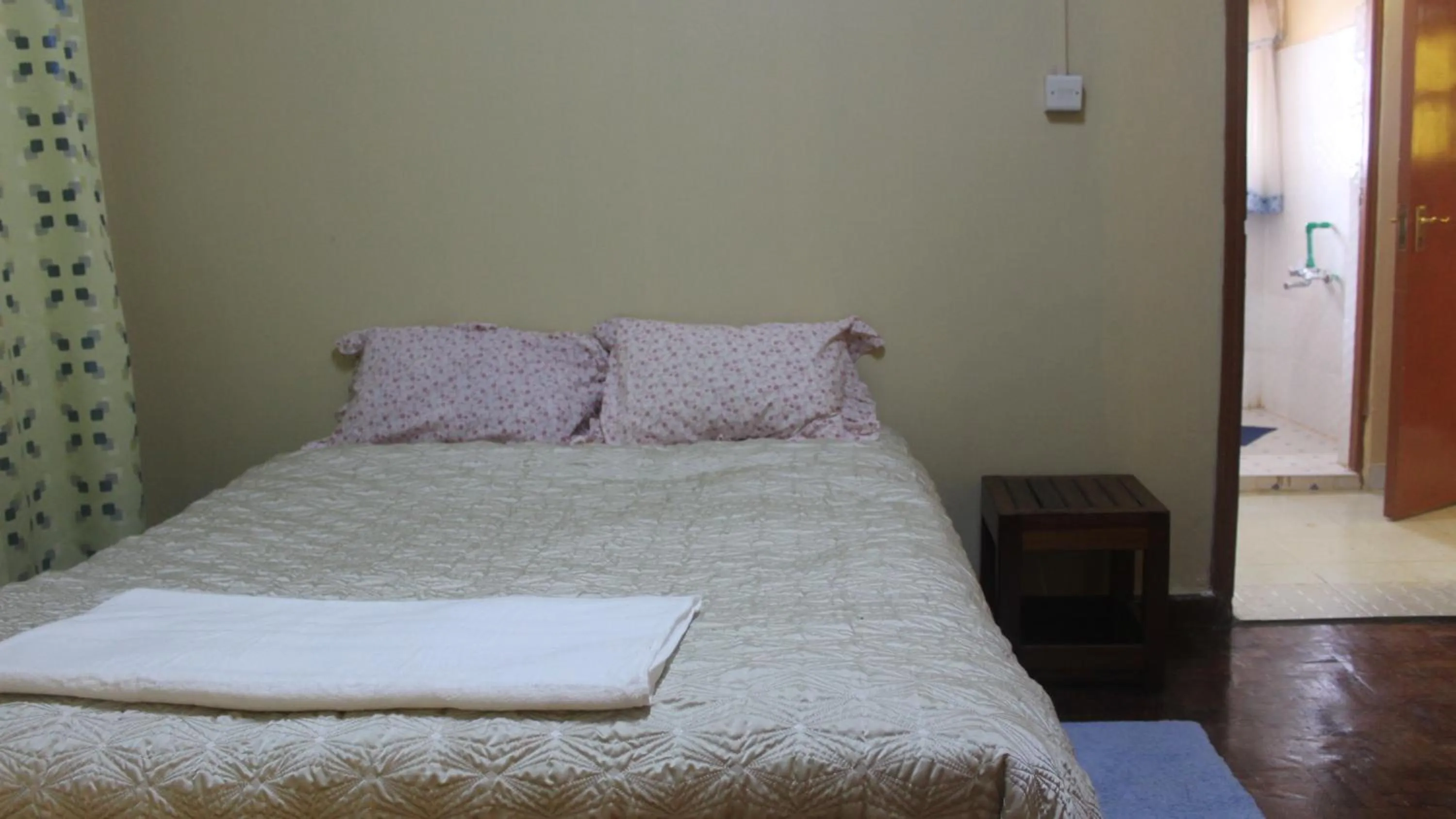 Bed in Tranquil Homestays