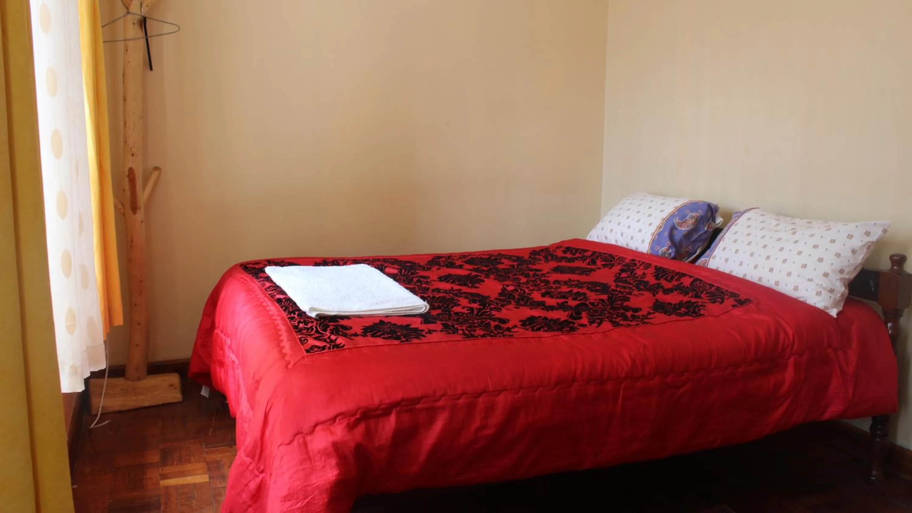 Bed in Tranquil Homestays