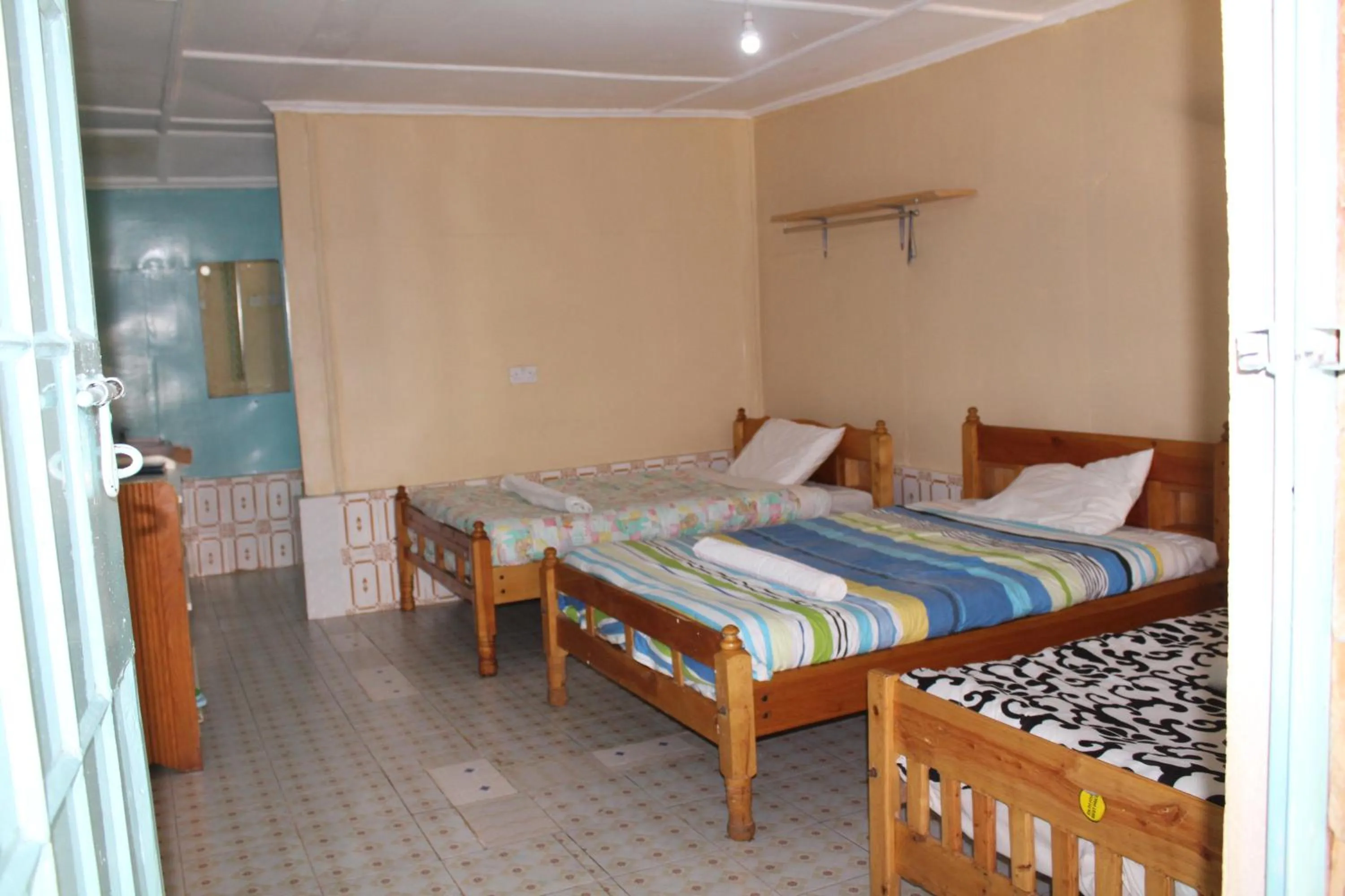 Bed in Tranquil Homestays