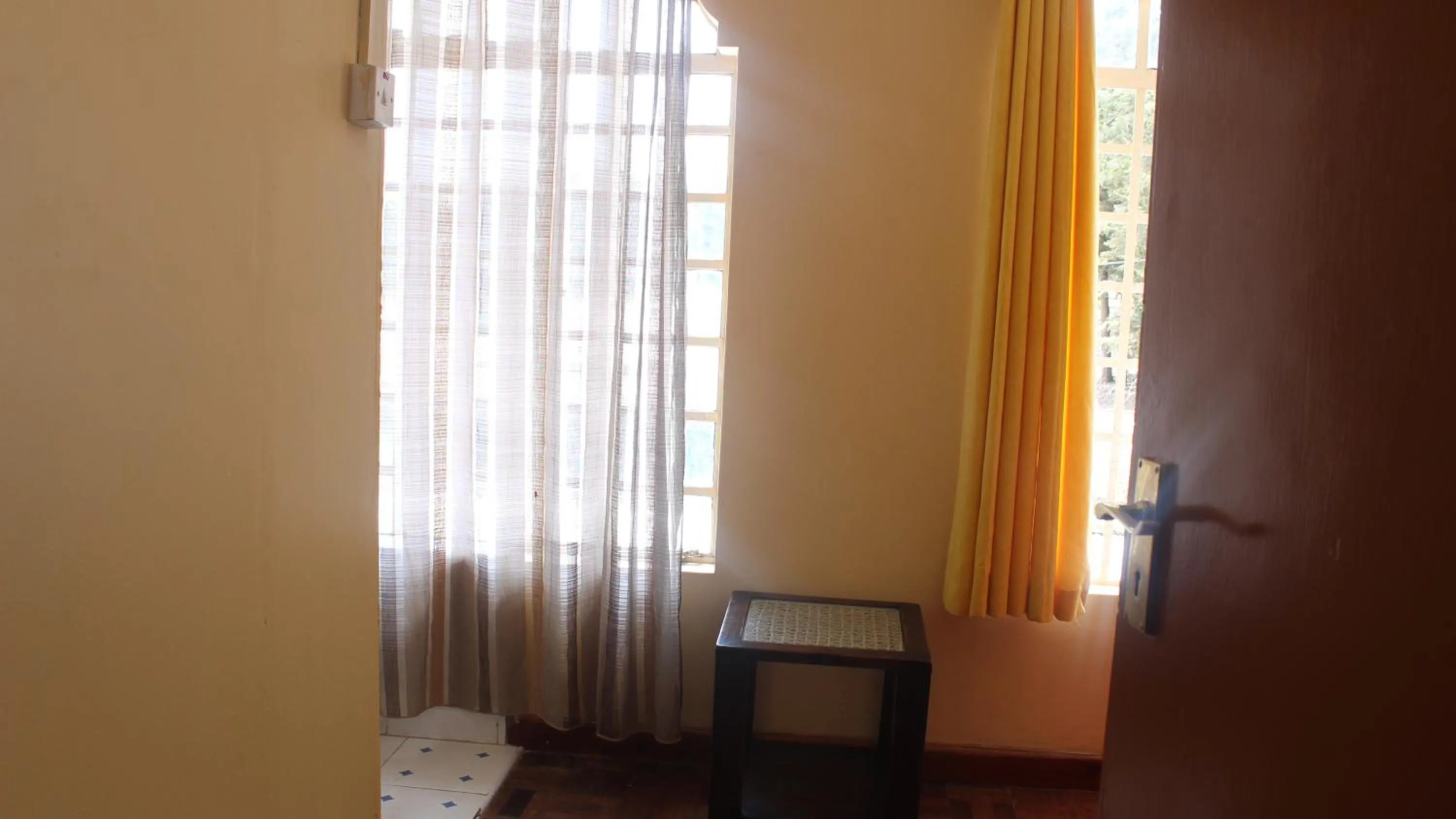 Bedroom in Tranquil Homestays