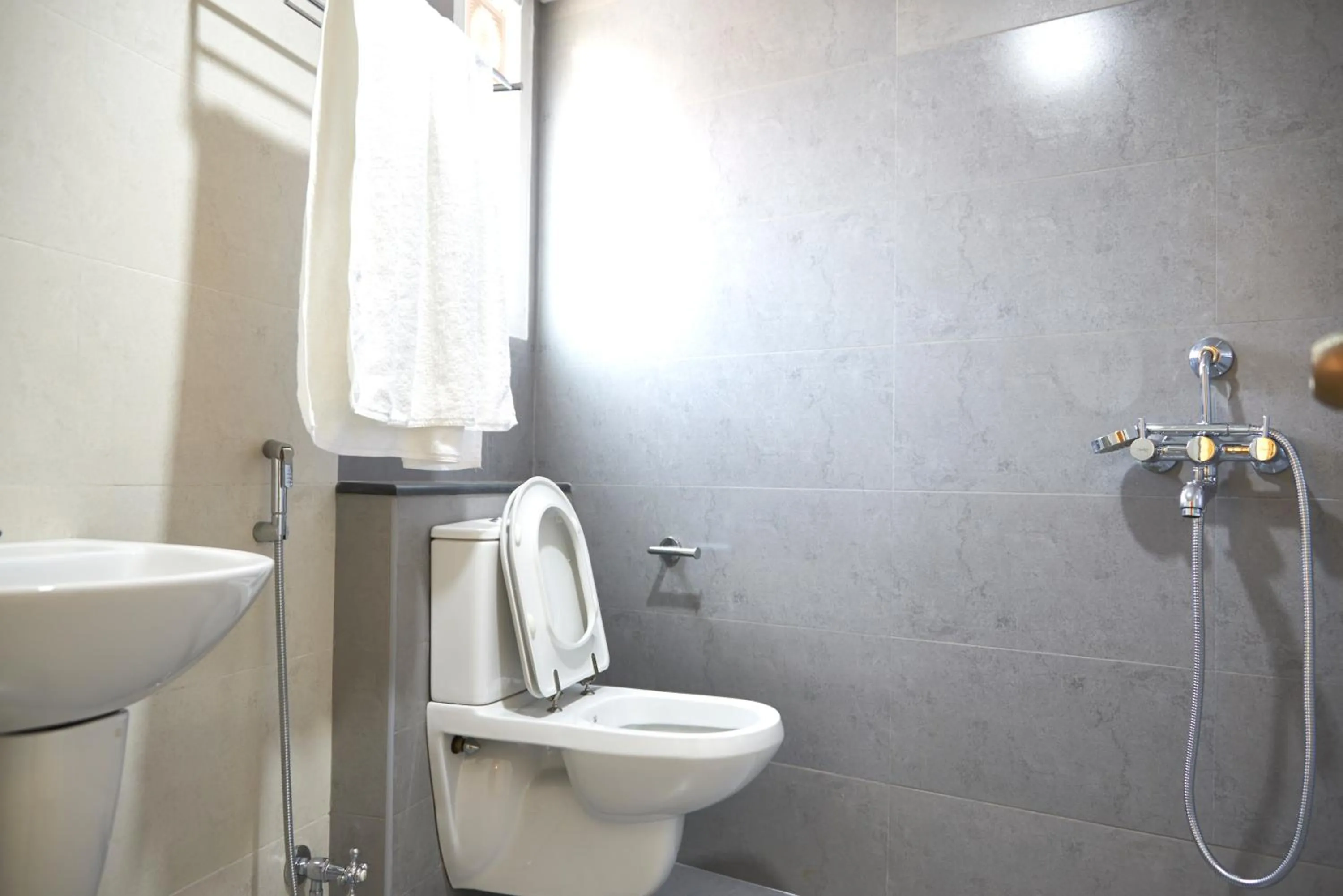 Bathroom in Srivar Hotels