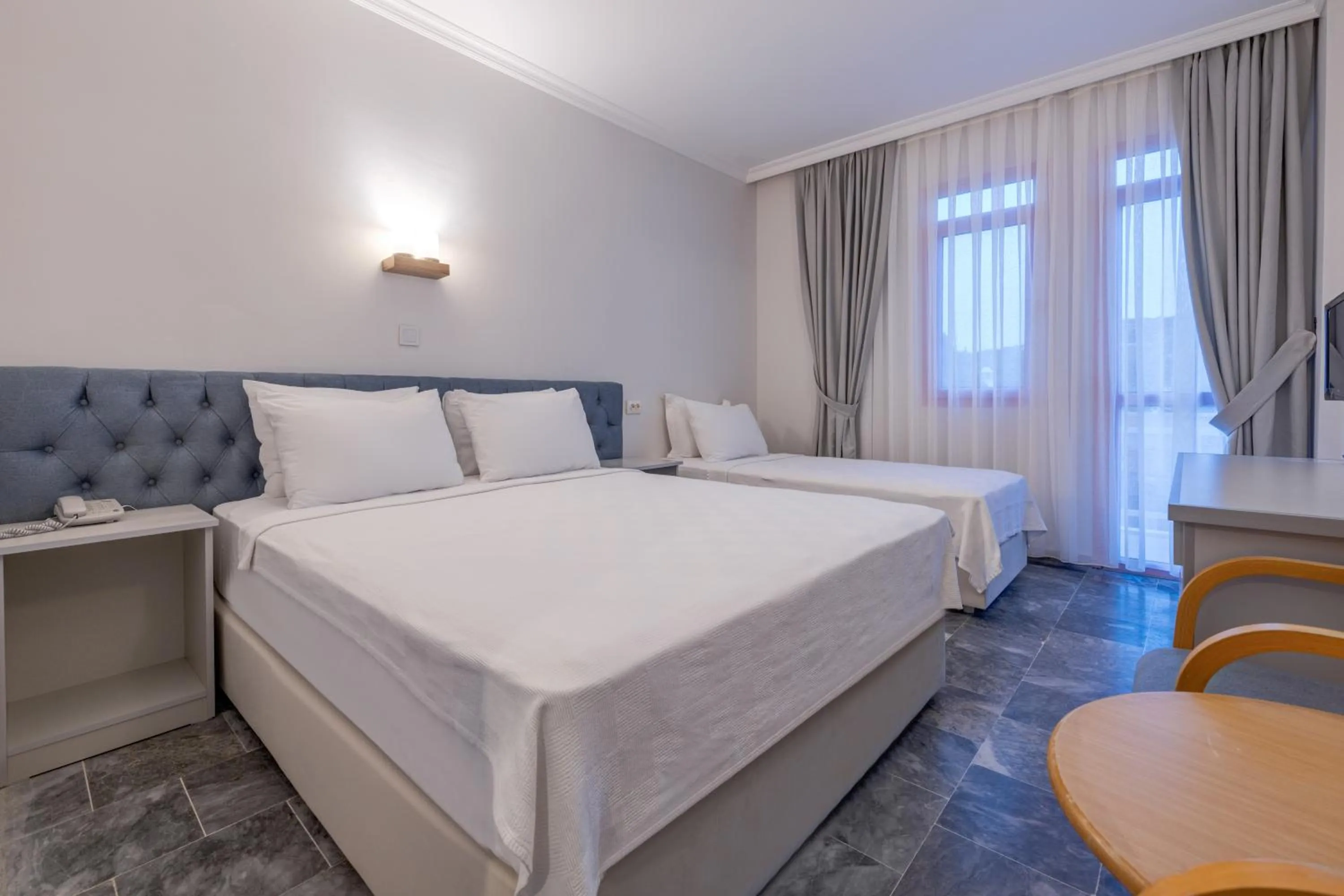 Bed in Hanedan Beach Hotel