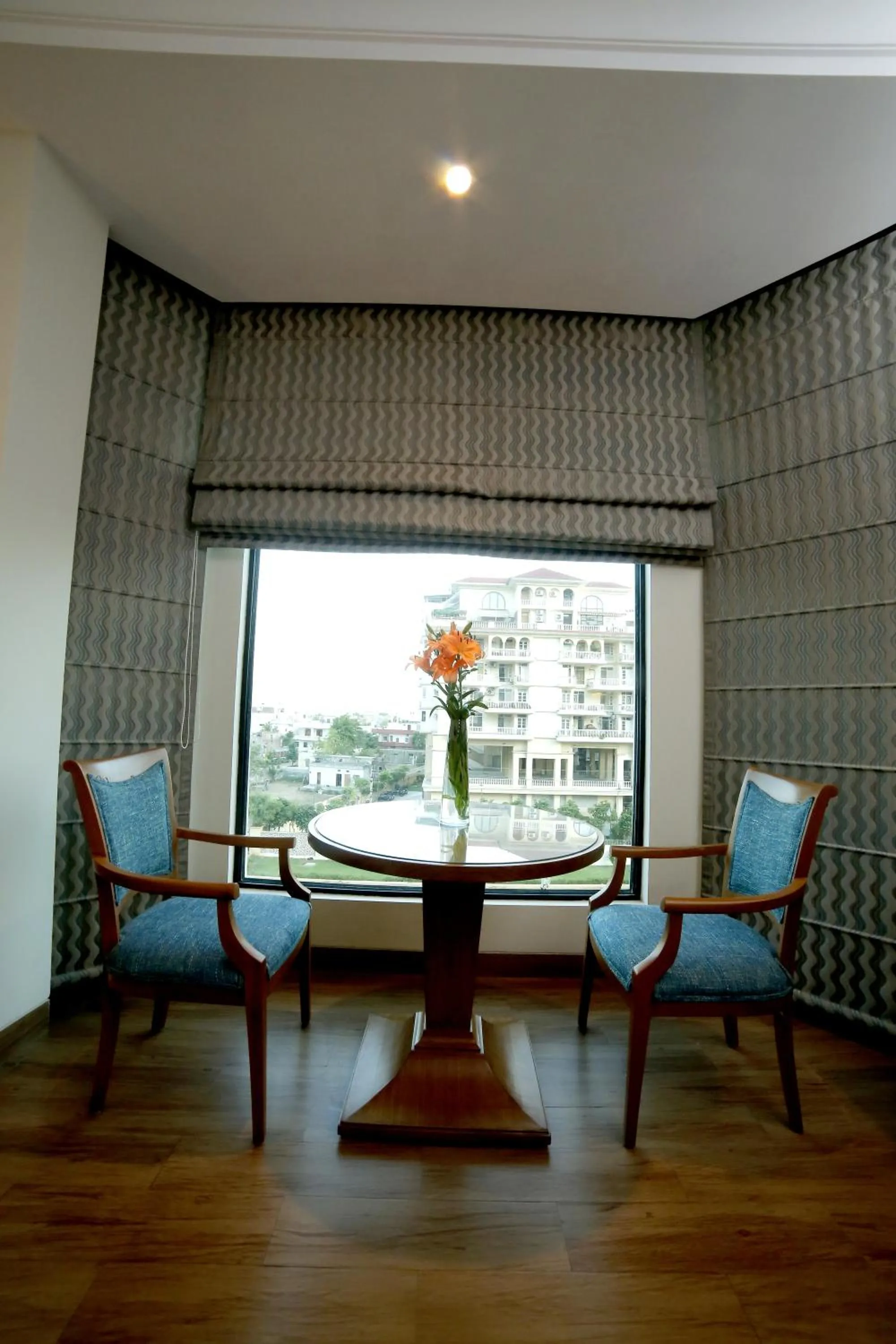 Seating area in The Lalit Traveller- Airport hotel