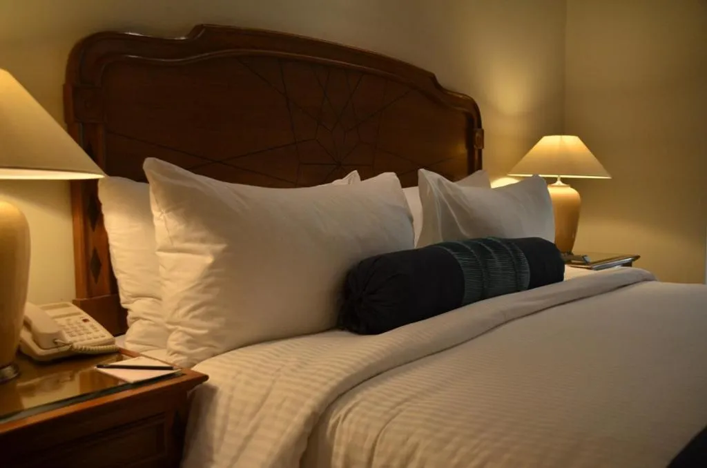 Bed in The Lalit Traveller- Airport hotel