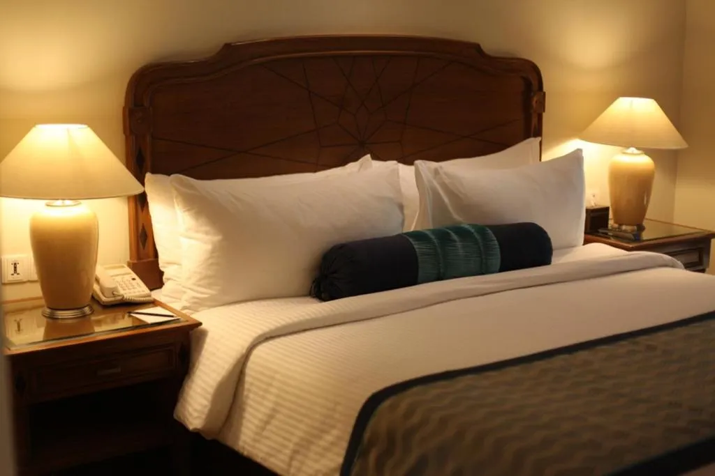 Bed in The Lalit Traveller- Airport hotel