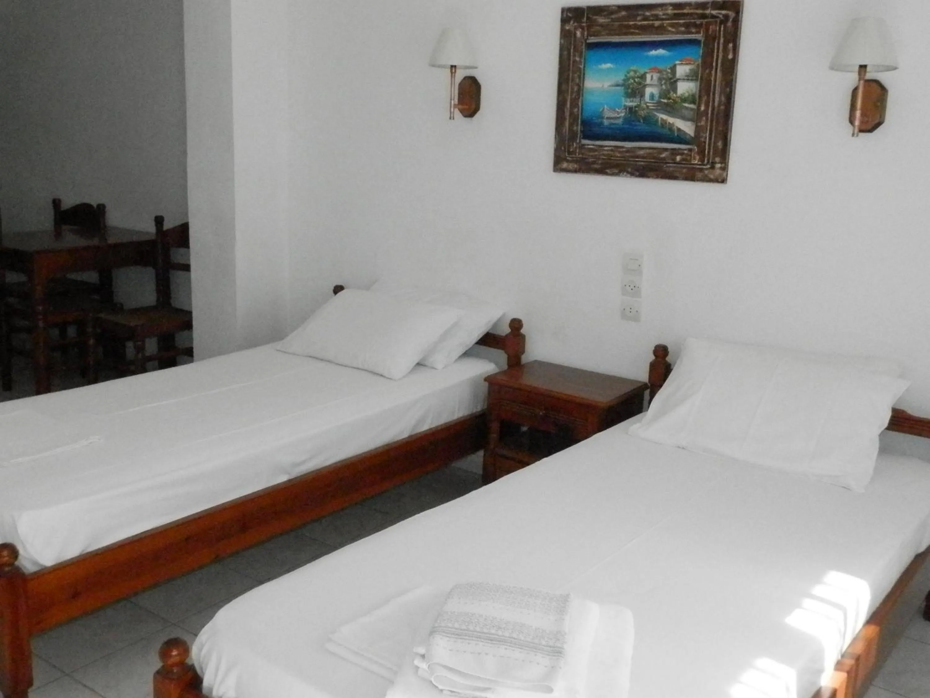 Bed in Aeolos Hotel Apartments