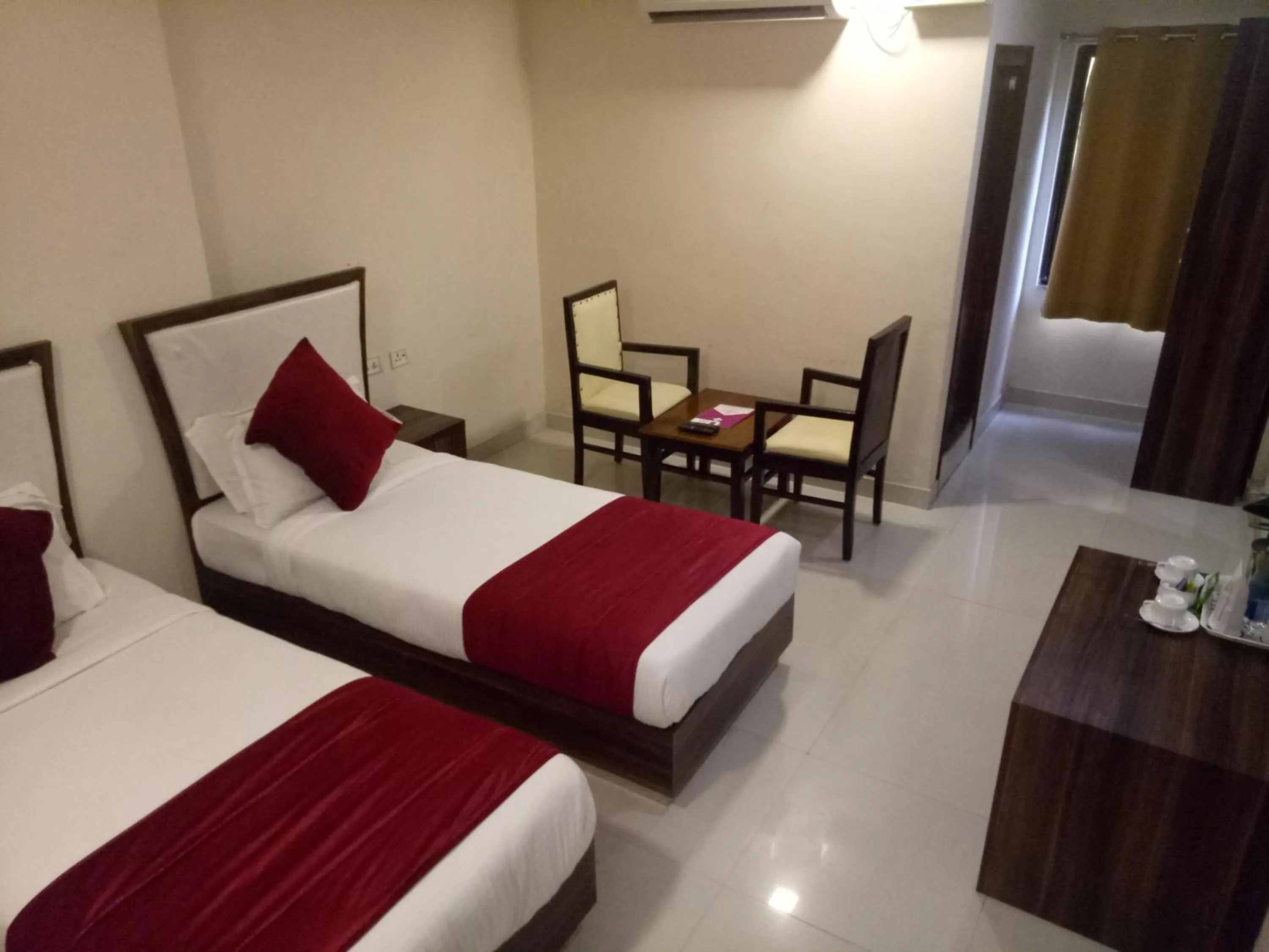 Photo of the whole room, Bed in Chinmaye Inn