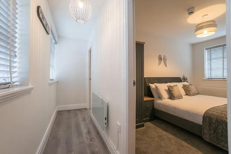 Bed in The Queens Arms Apartments