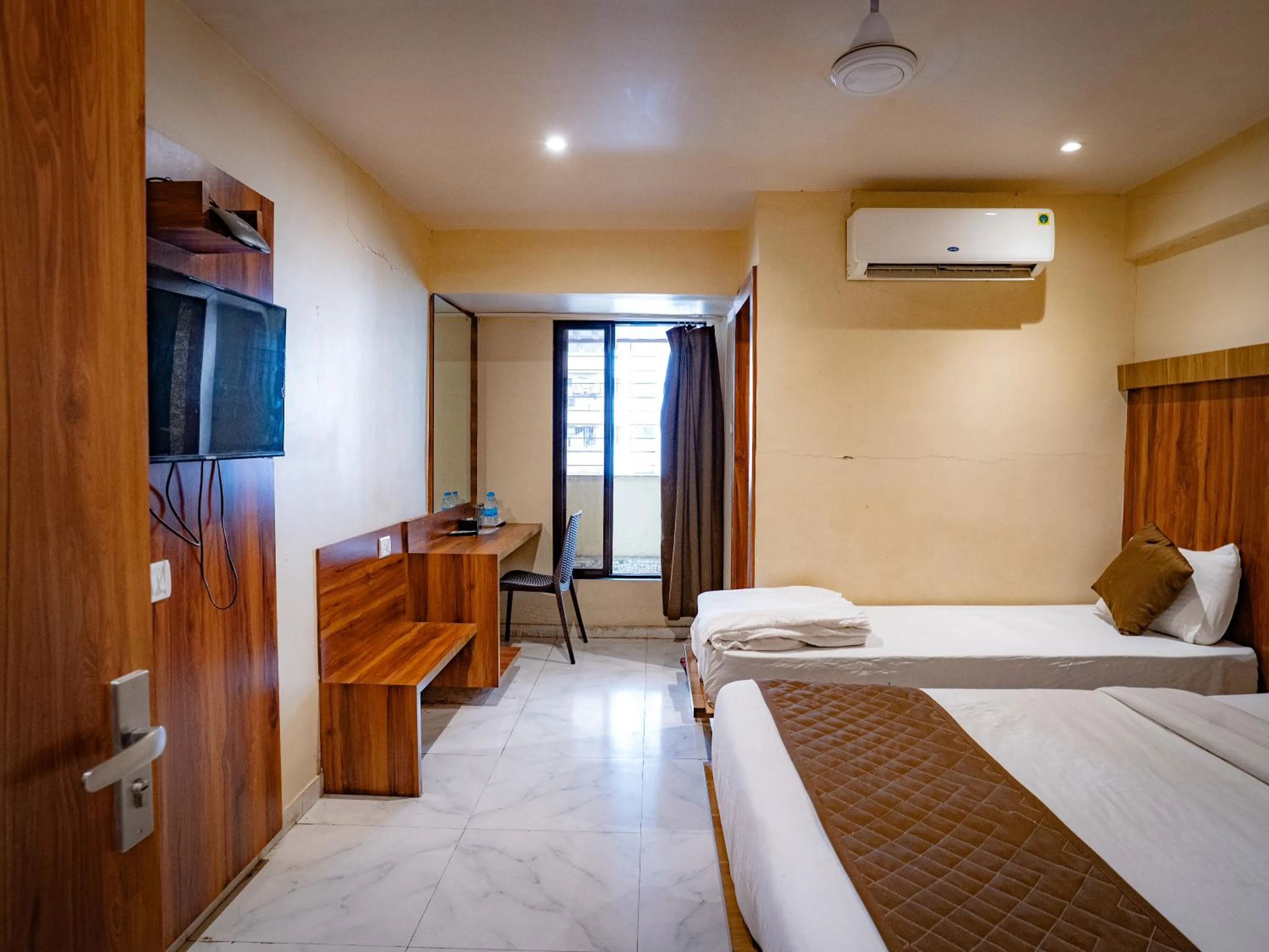Bed in Hotel Mourya Residency