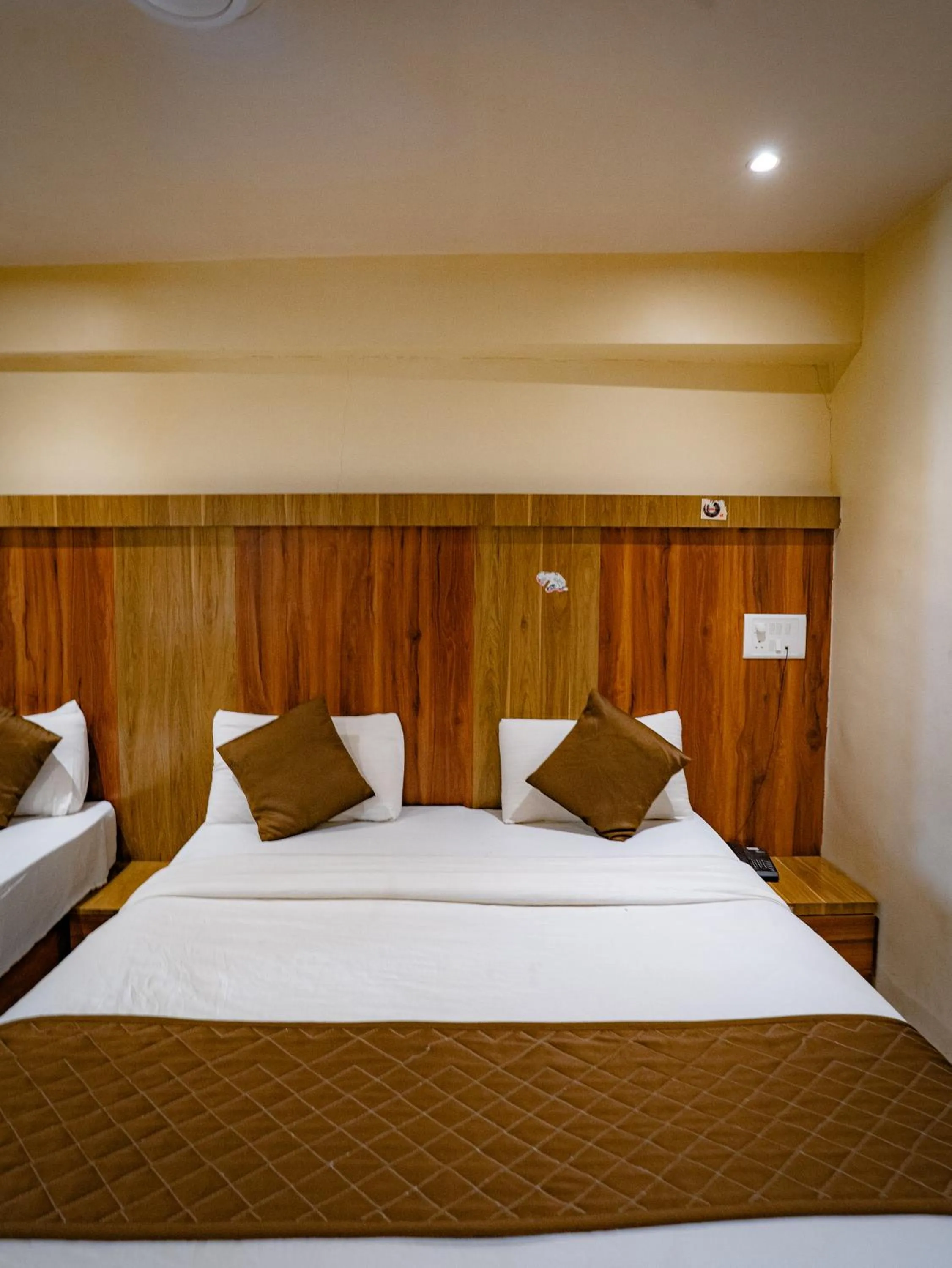 Bed in Hotel Mourya Residency