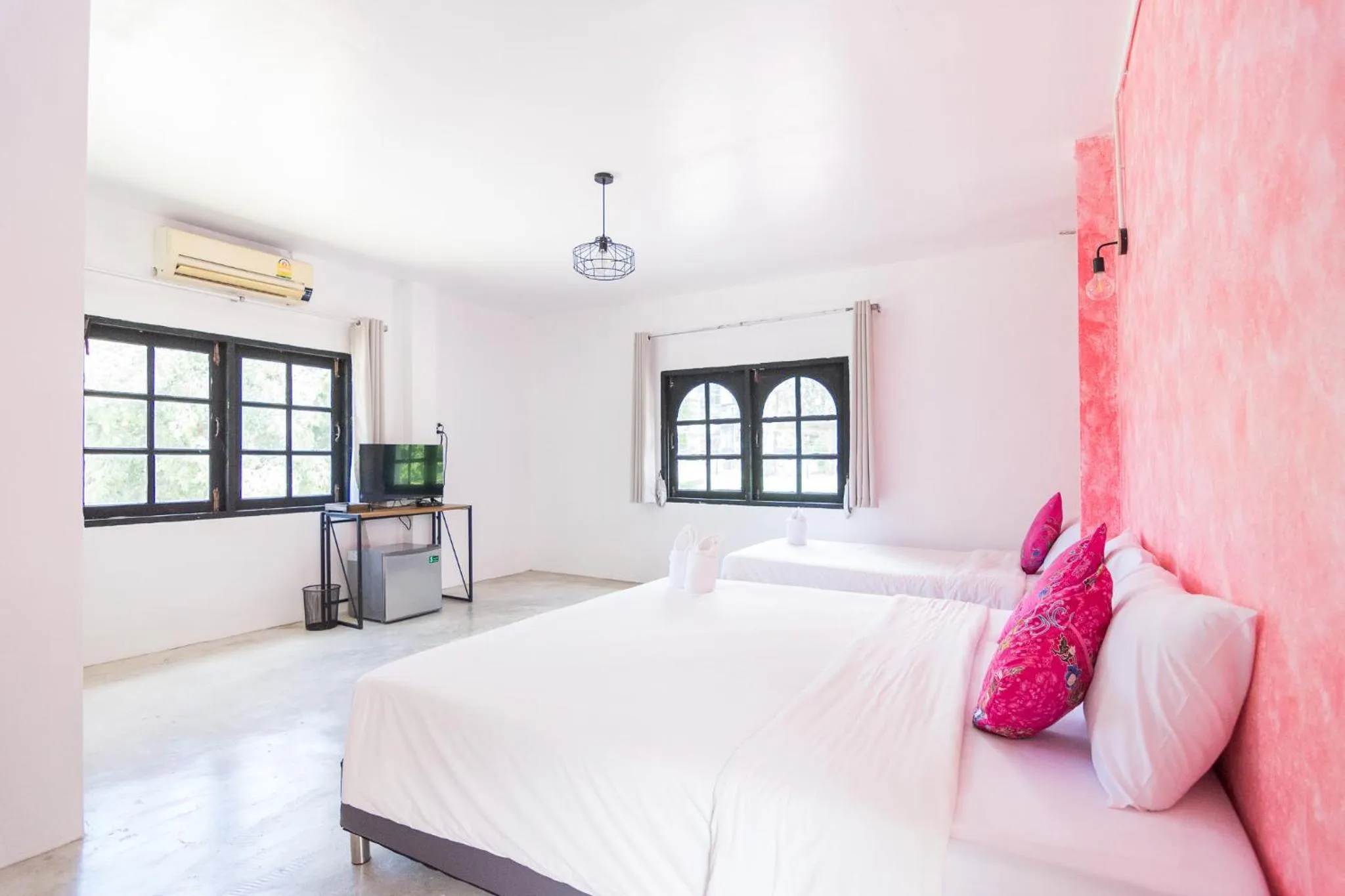 Bed in THANSILA Resort