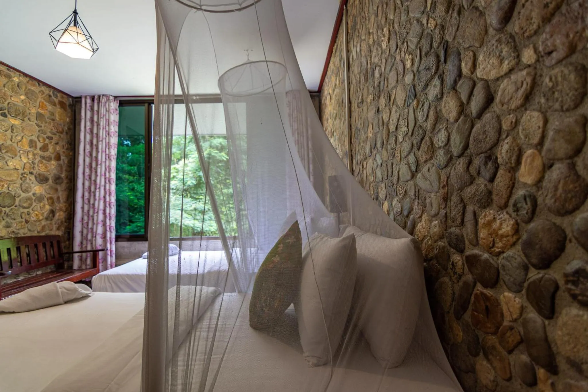 Bed in THANSILA Resort