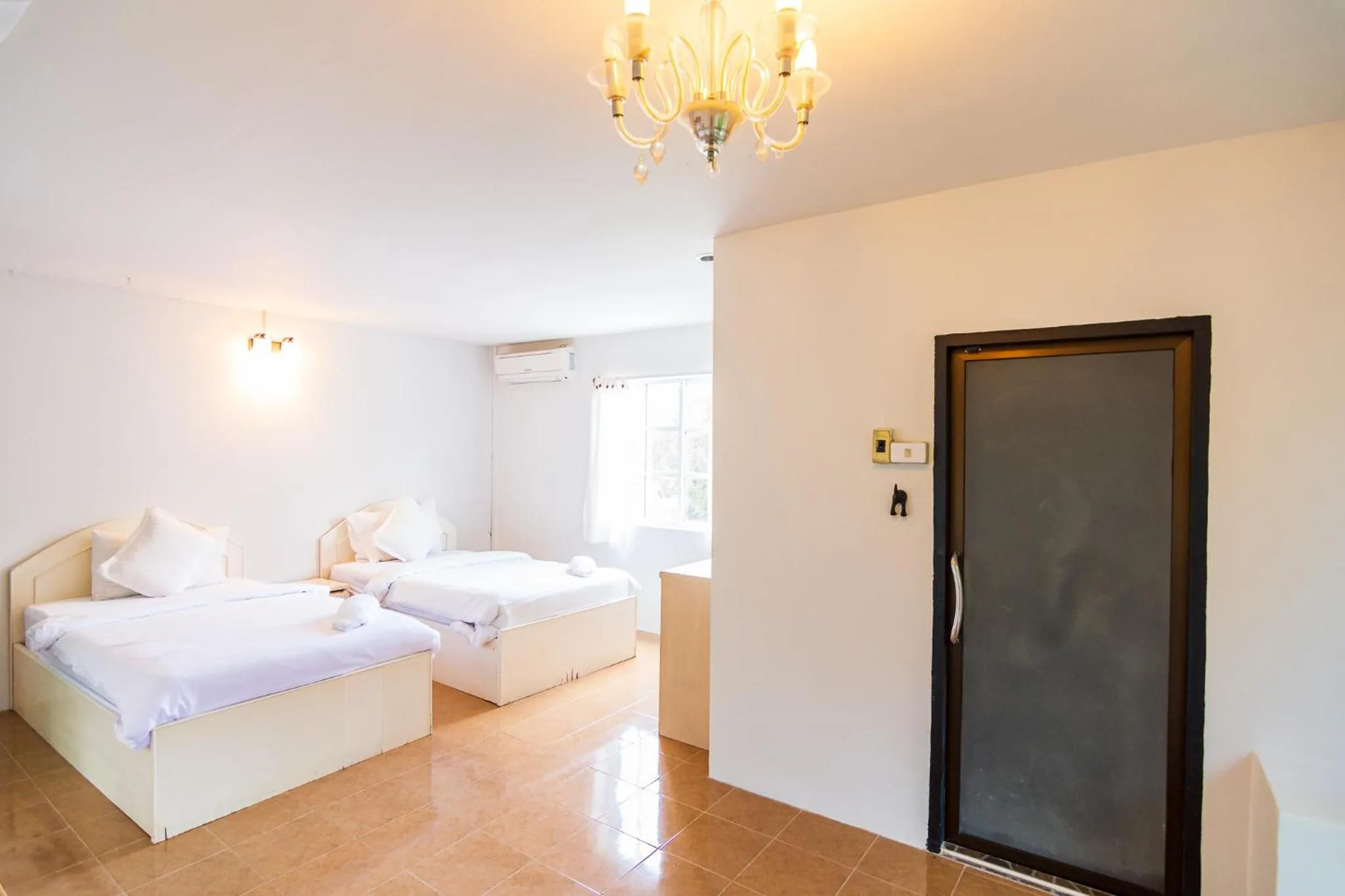 Bed in THANSILA Resort