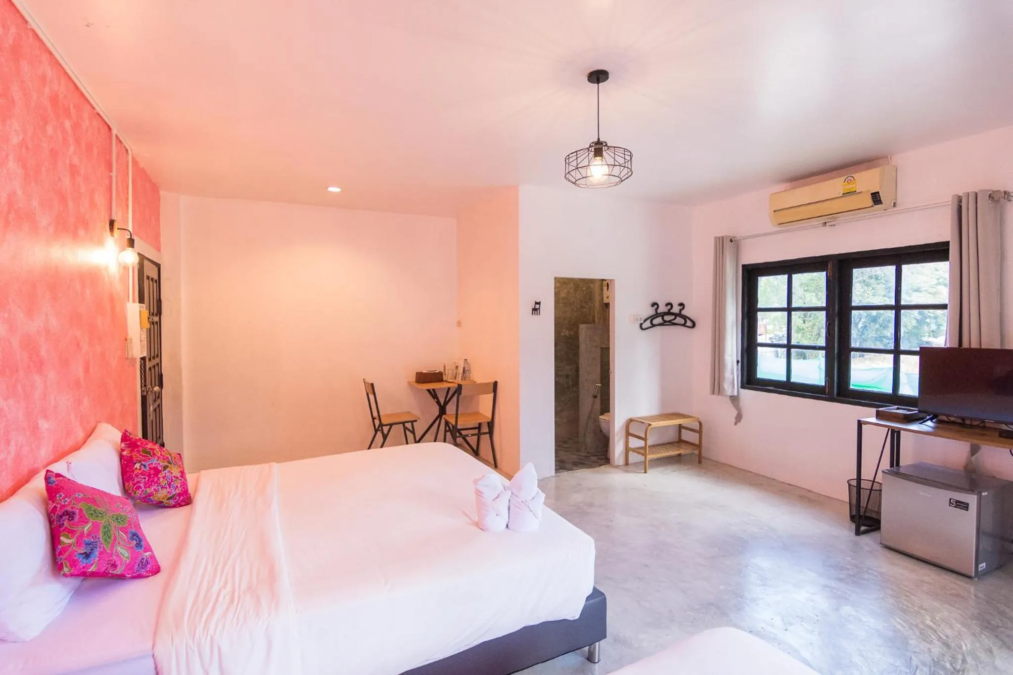 Bed in THANSILA Resort