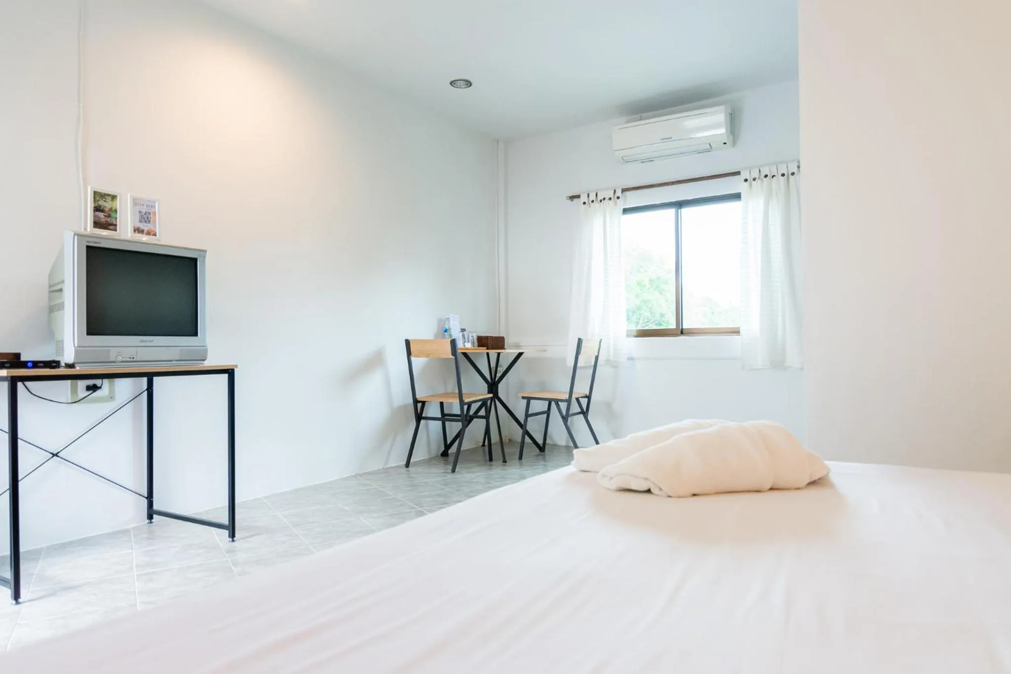 Bed in THANSILA Resort