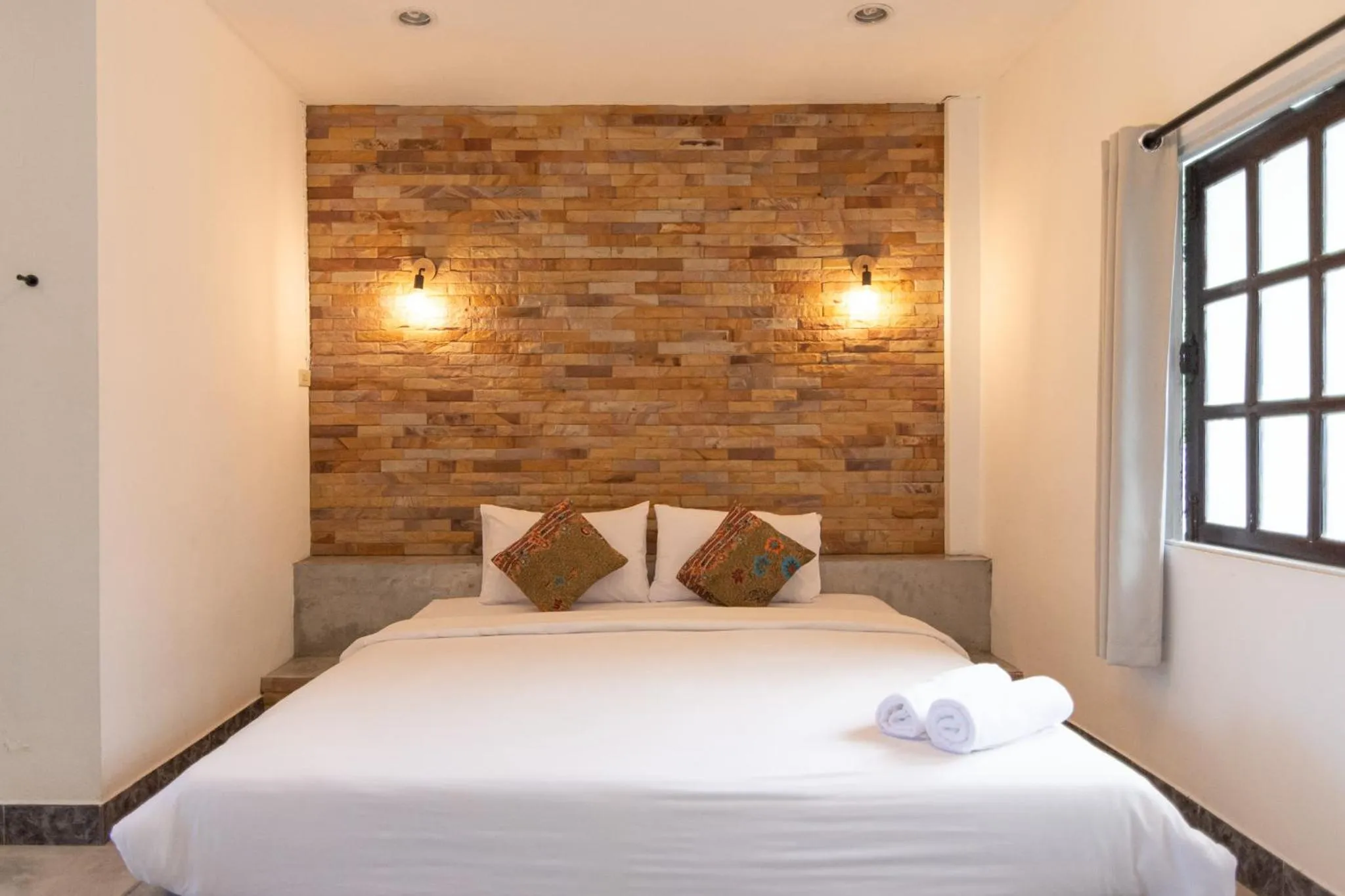 Bed in THANSILA Resort