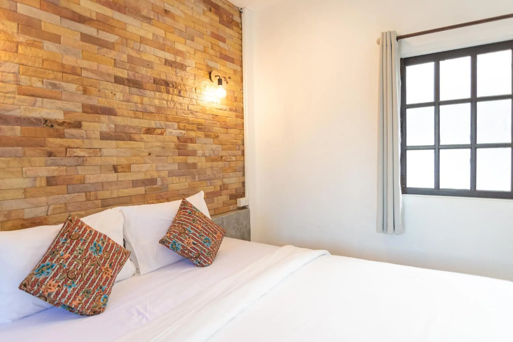 Bed in THANSILA Resort