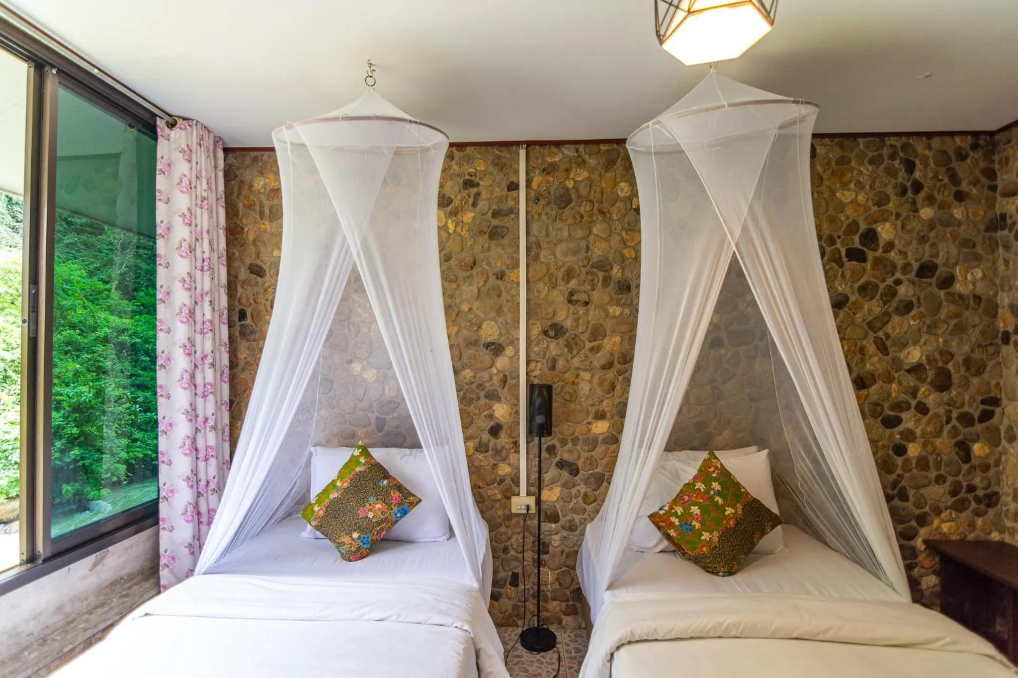 Bed in THANSILA Resort