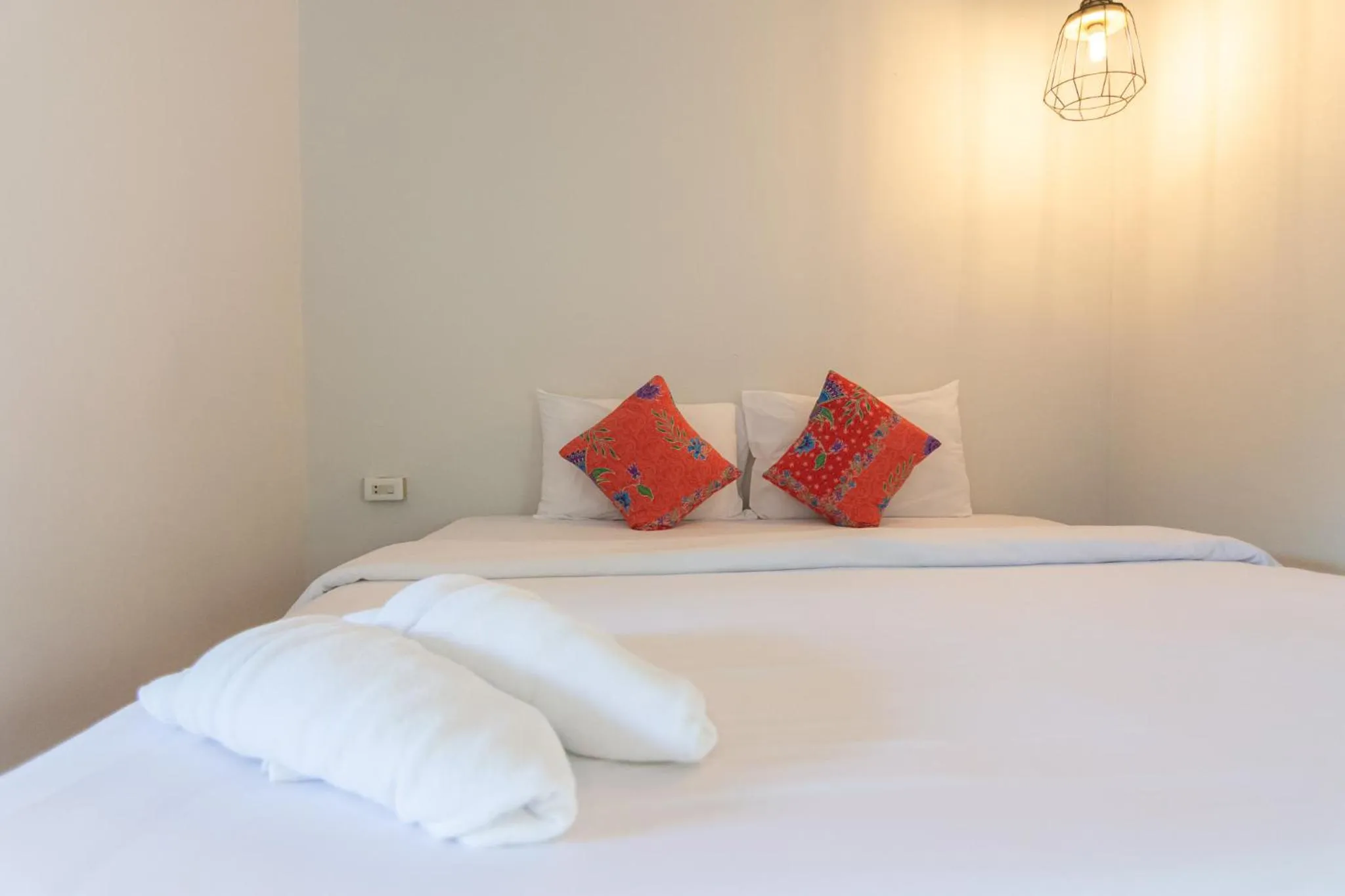 Bed in THANSILA Resort