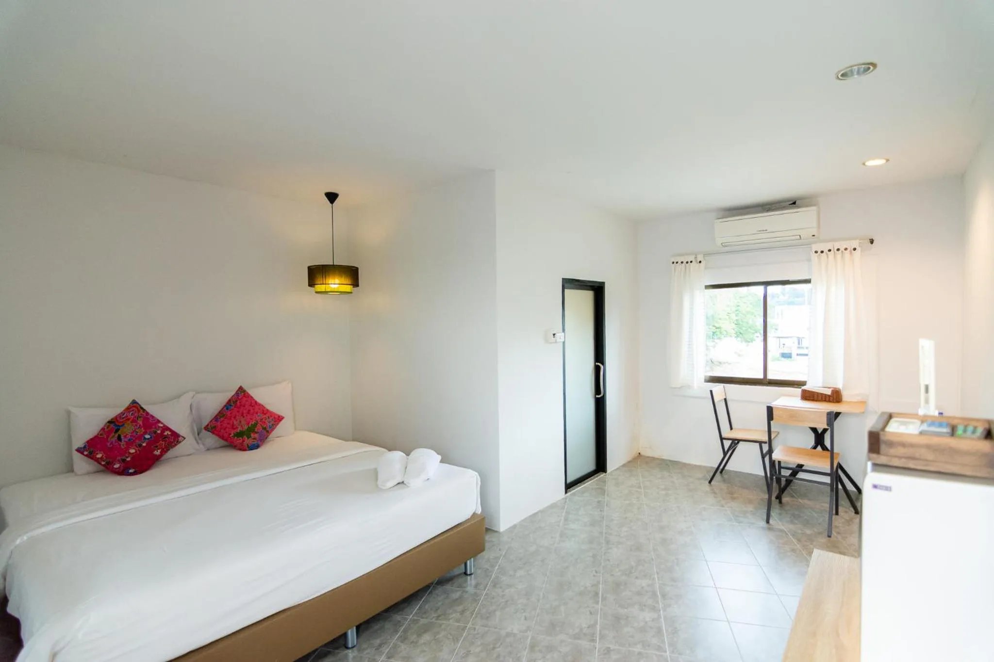 Bed in THANSILA Resort