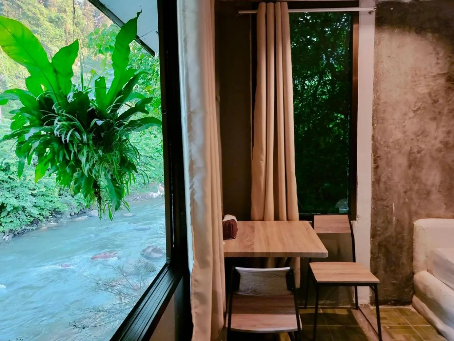 Seating area in THANSILA Resort