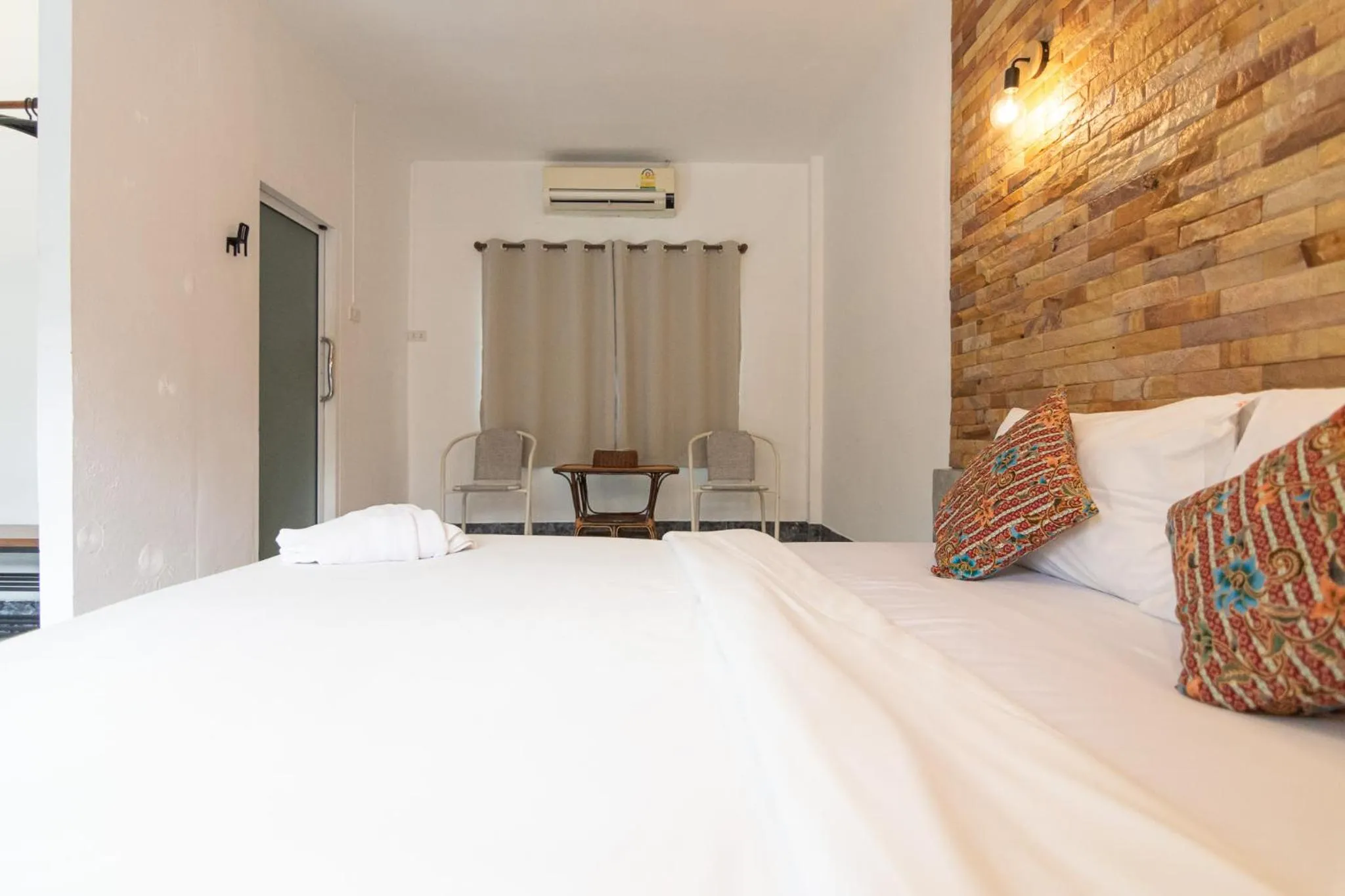 Bed in THANSILA Resort