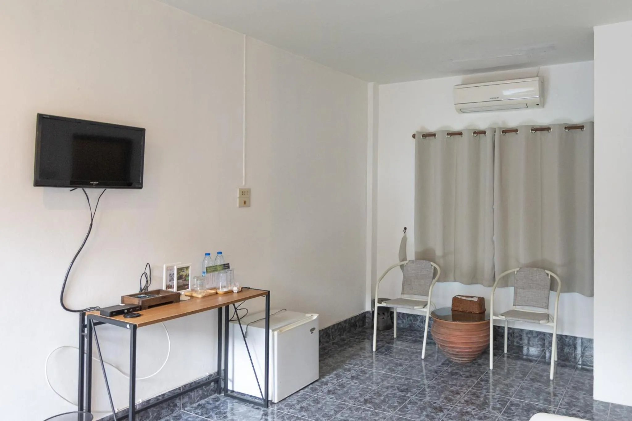 Seating area in THANSILA Resort