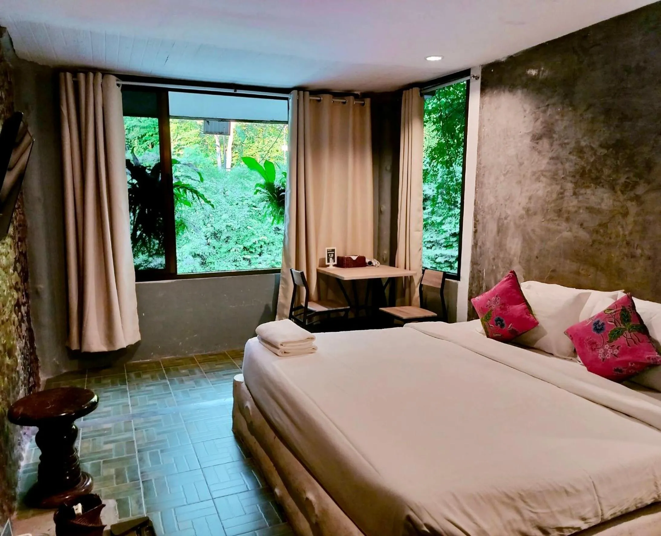 Bed in THANSILA Resort