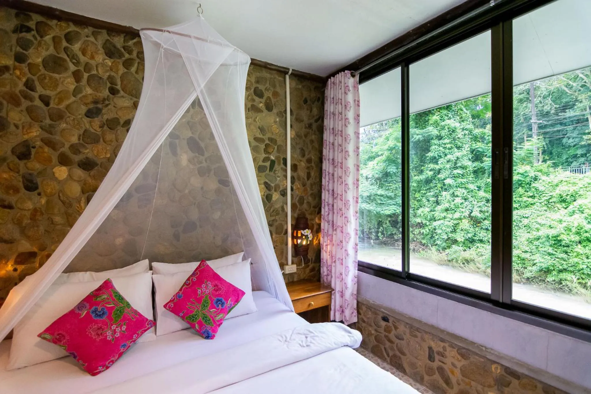 Bed in THANSILA Resort