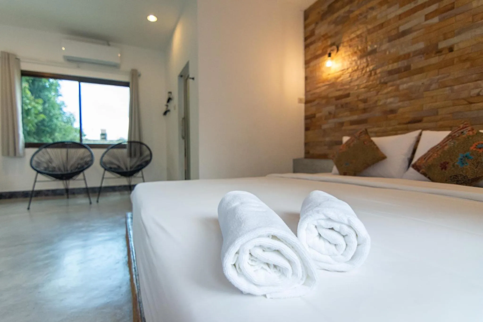 Bed in THANSILA Resort