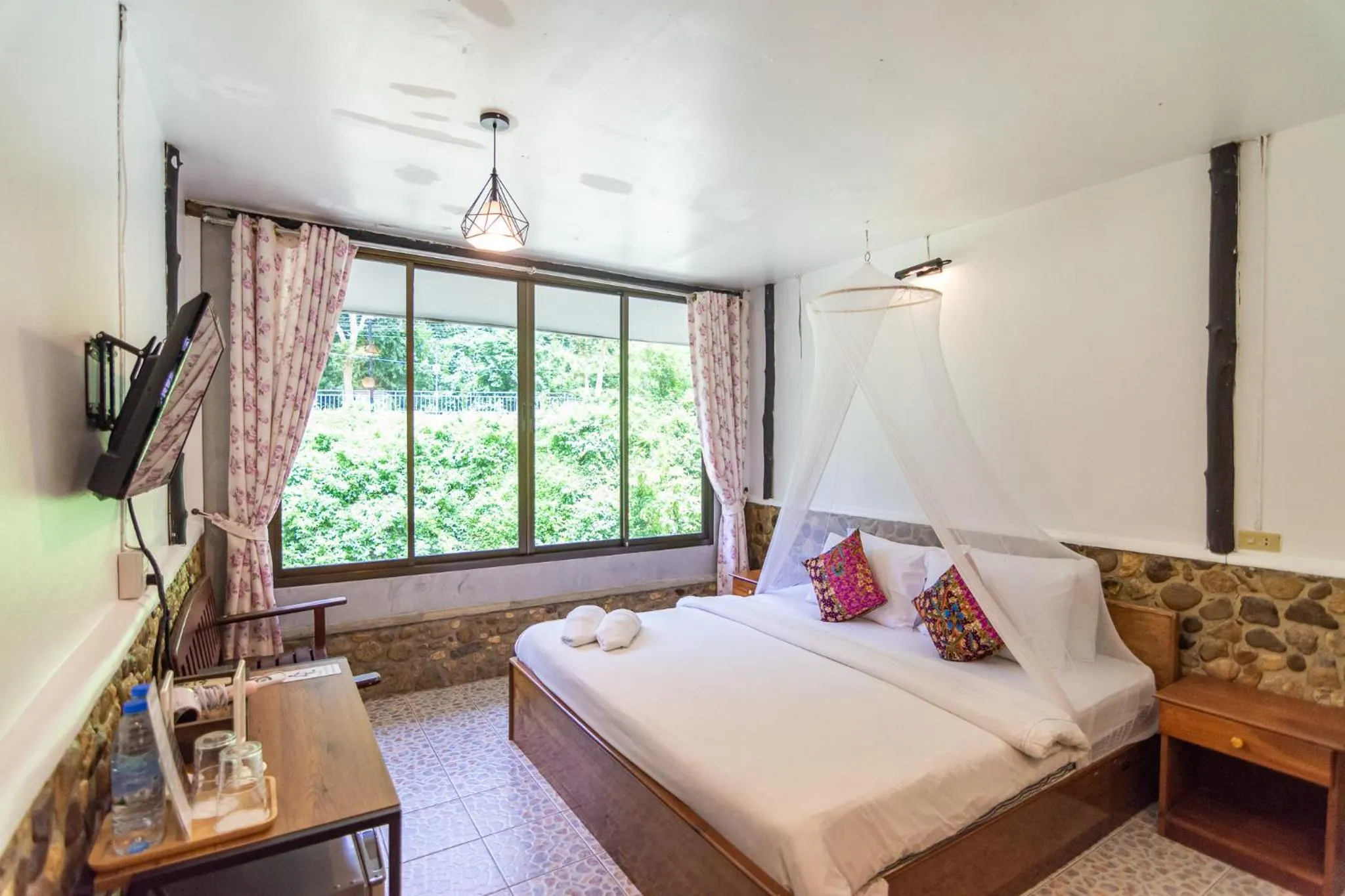 Bed in THANSILA Resort