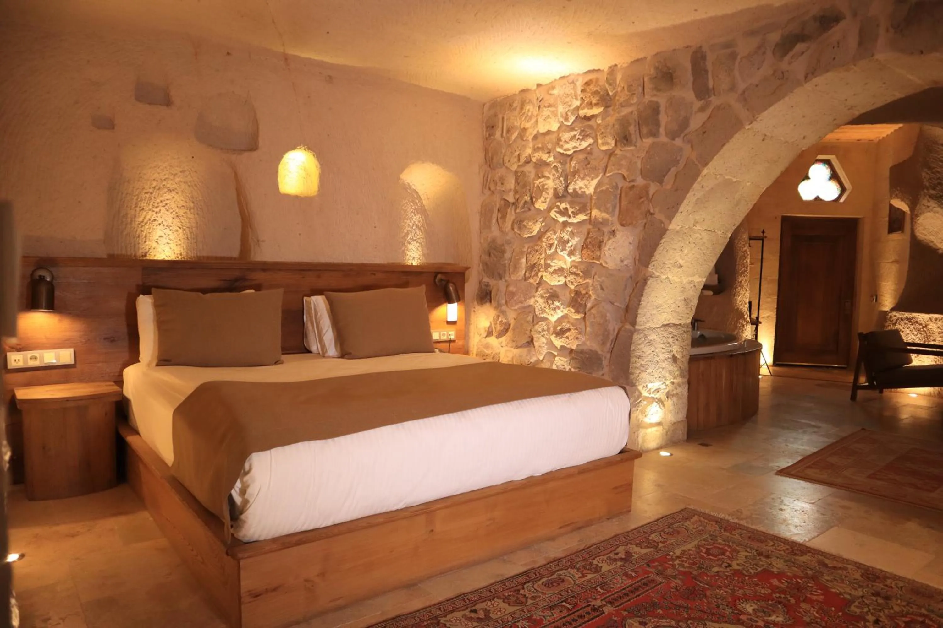 Bed in Kappadoks Cave Hotel
