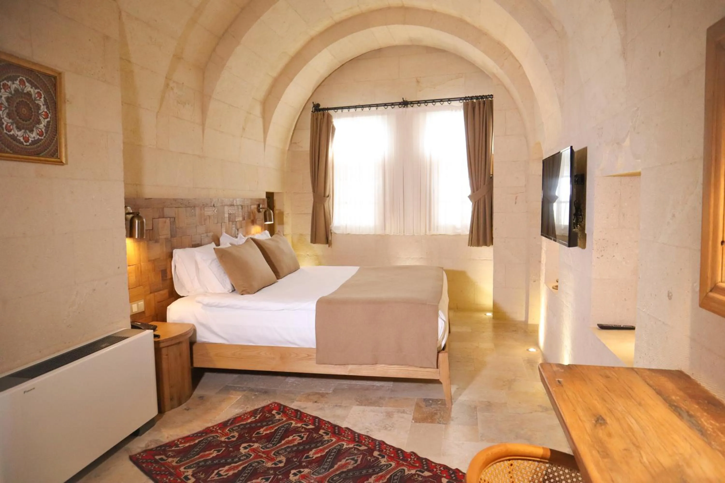 Bed in Kappadoks Cave Hotel