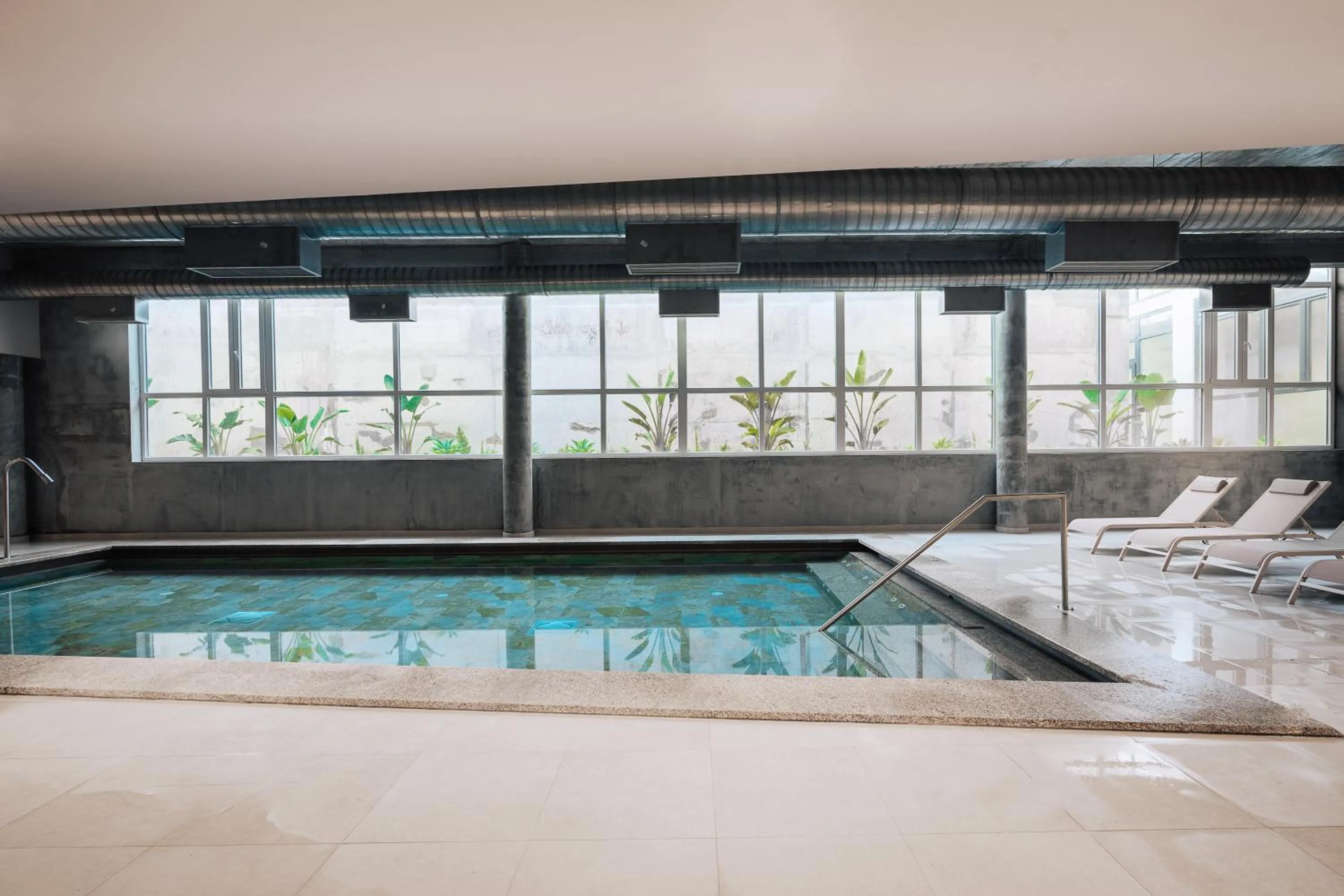 Swimming pool in Porto Covo Praia Hotel & SPA