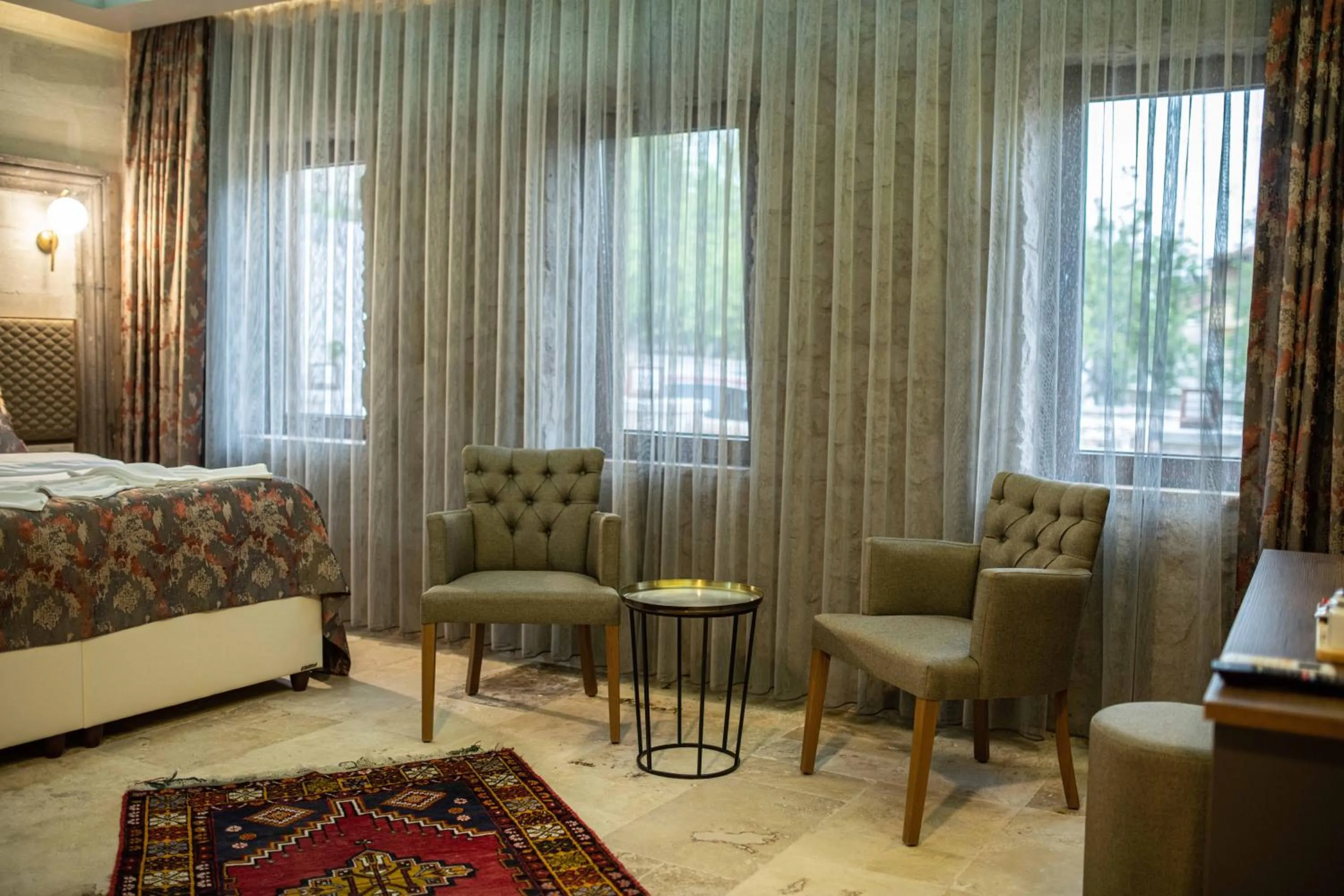 Seating area, Bed in Ahiyan Hotel