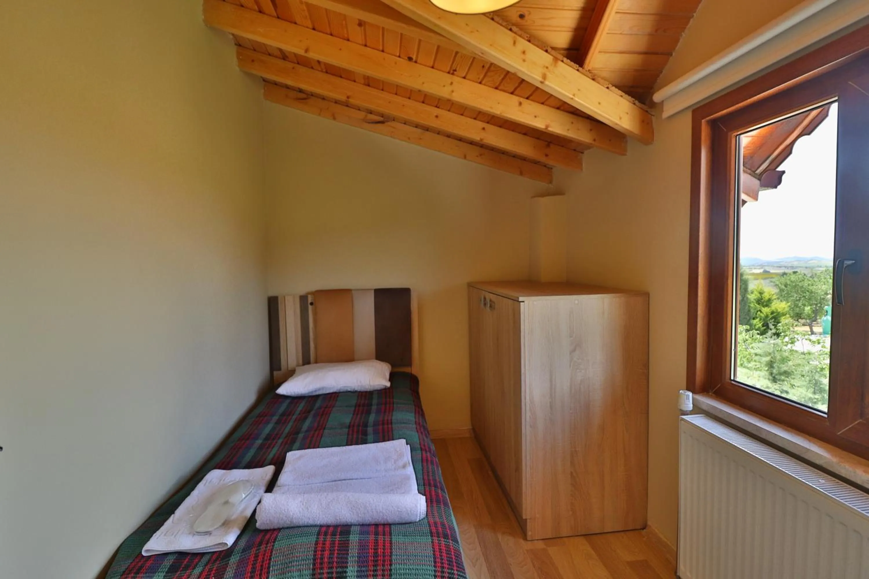 Bed in Dessera Vineyards Hotel