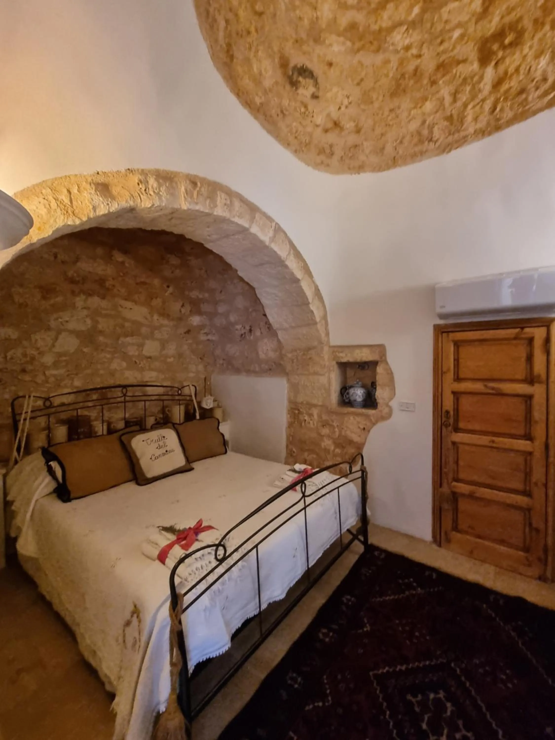 Bed in Trulli del Carmine