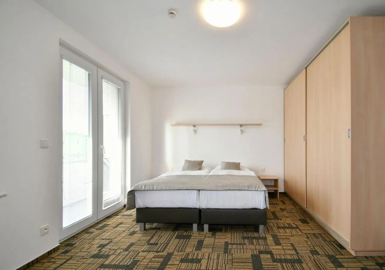 Bed in eFi Palace Hotel