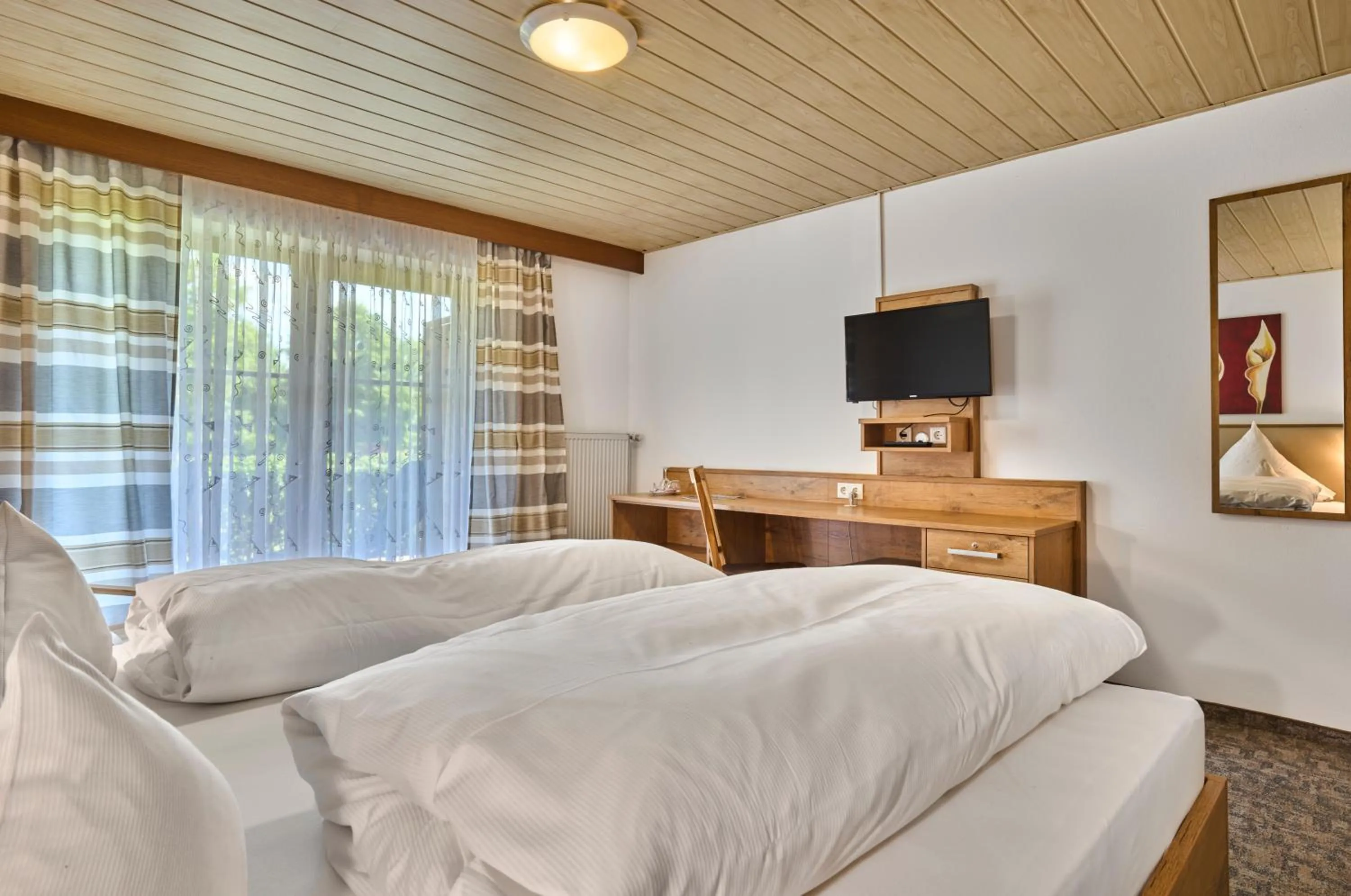 Bed in Gasthof Pension Fischerstüberl