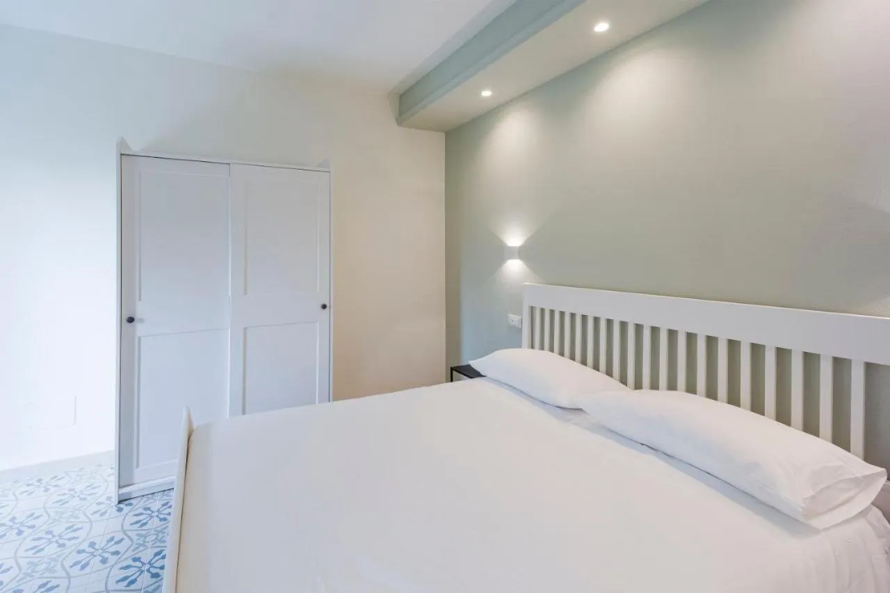 Bed in Gli Ulivi Rooms And Breakfast